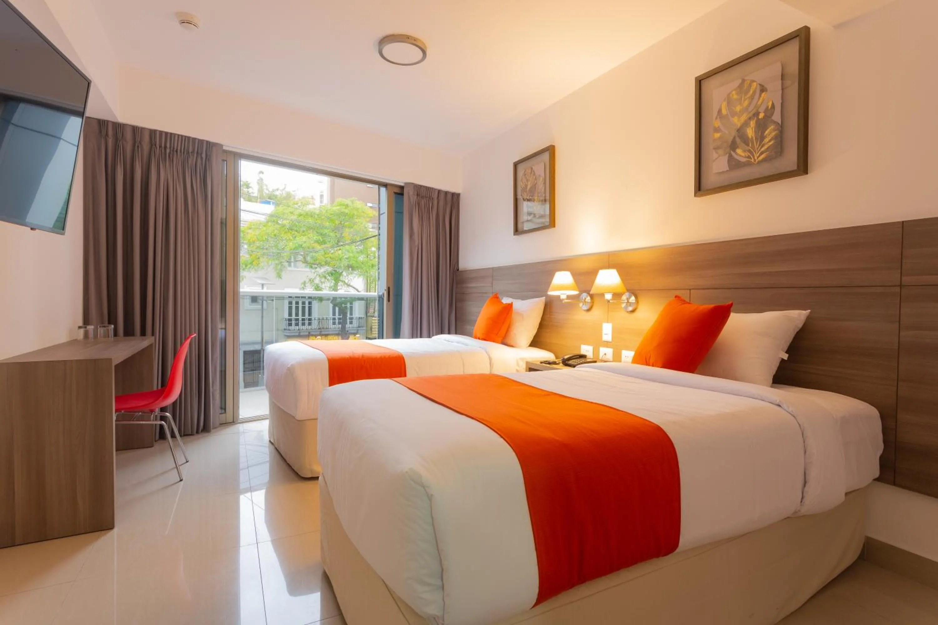 Bed in Howard Johnson by Wyndham Lima Miraflores Art House