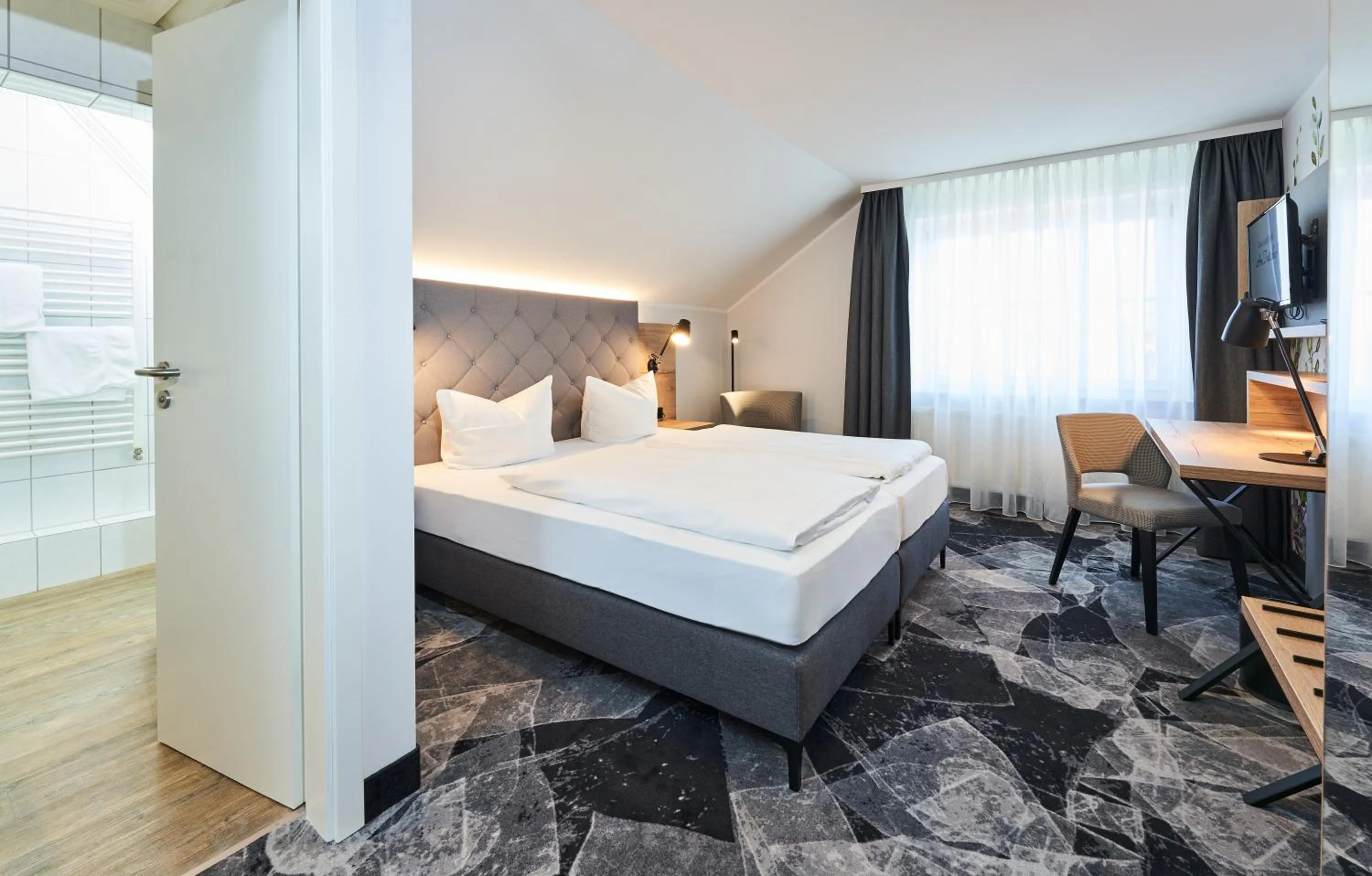 Bed in Das Landhotel am Trätzhof Fulda