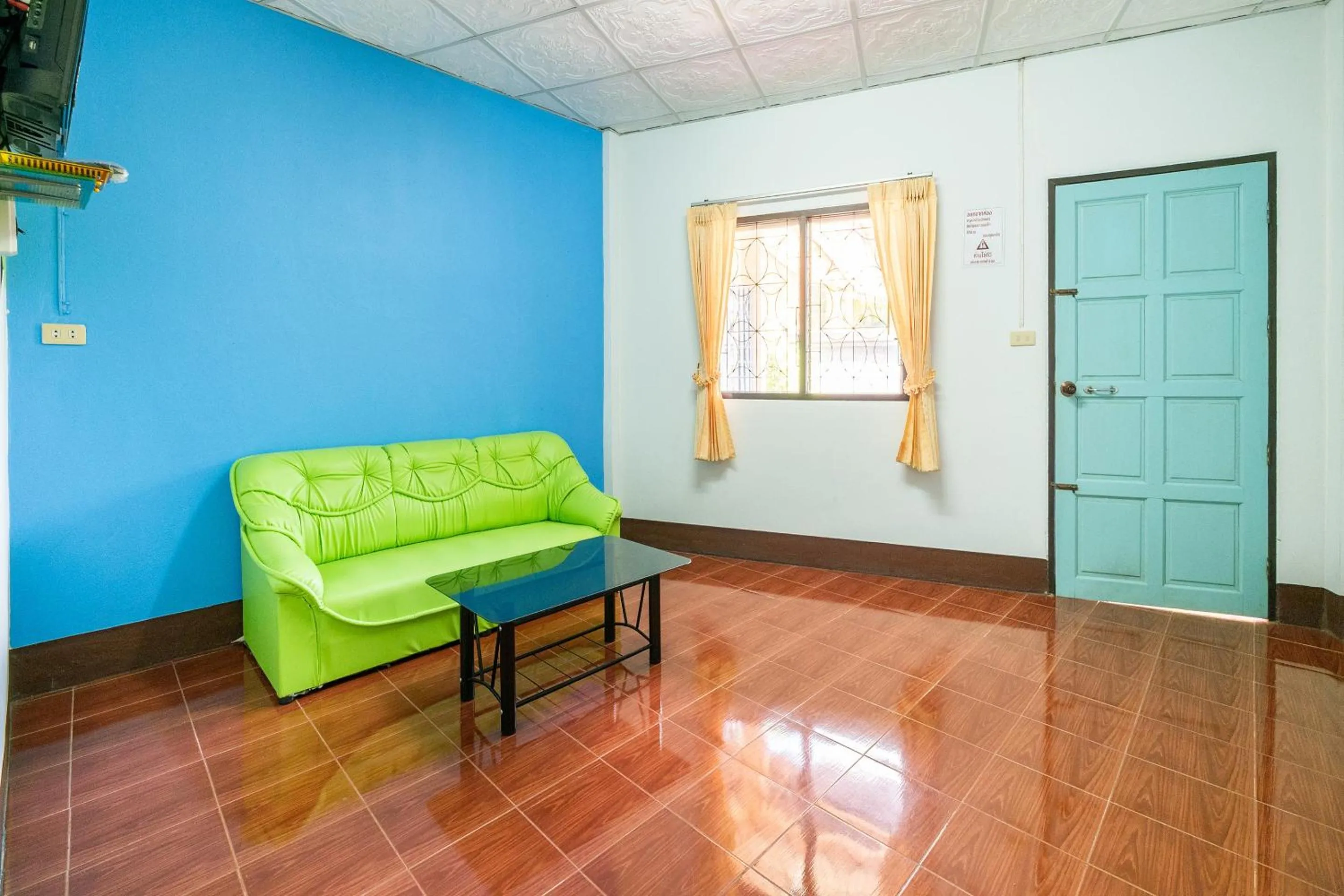 Living room in OYO 608 Maleena Home