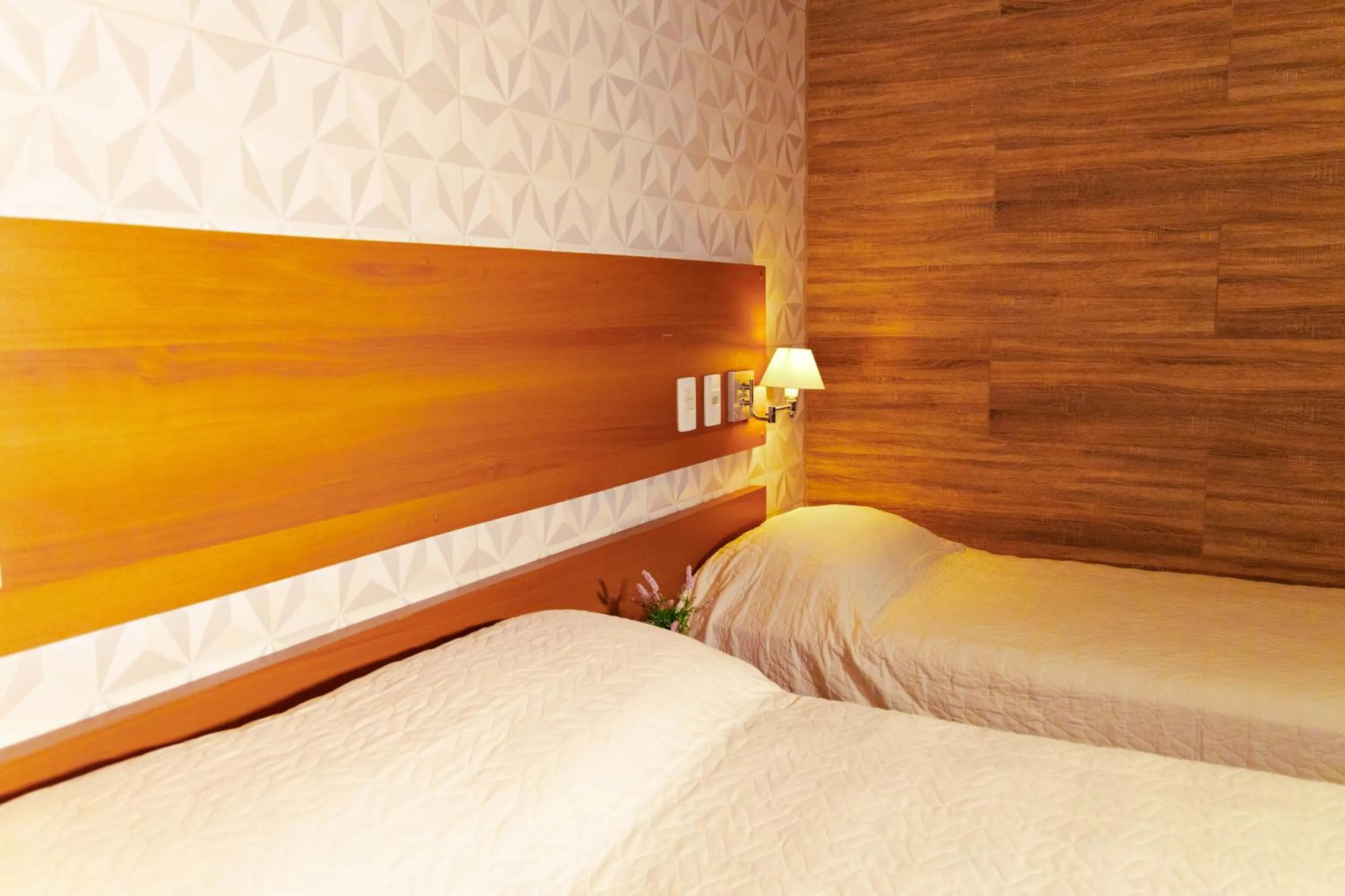 Bed in Pousada Costa Doce