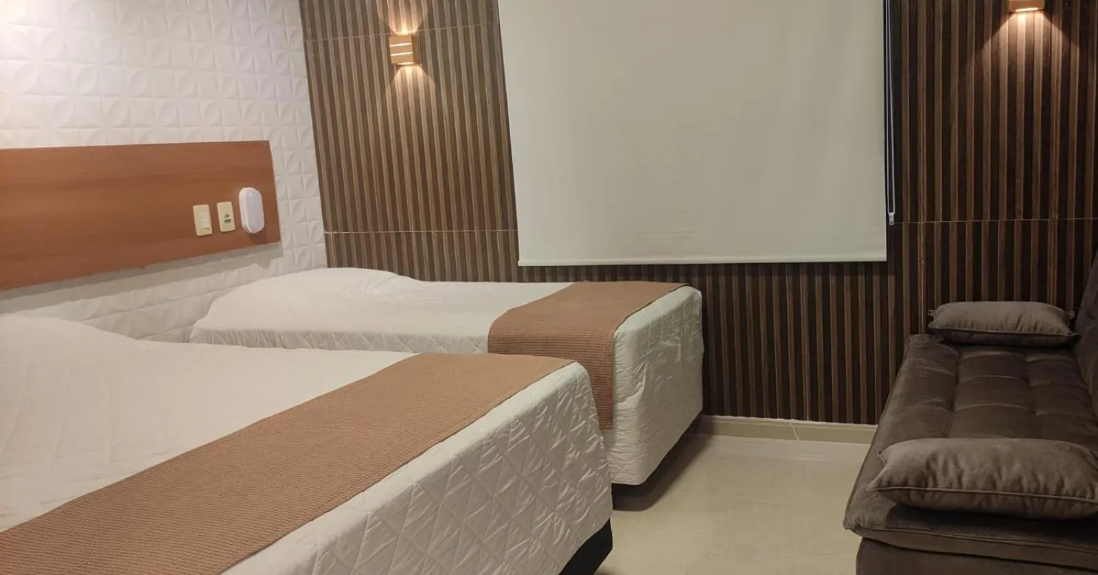 Bed in Pousada Costa Doce