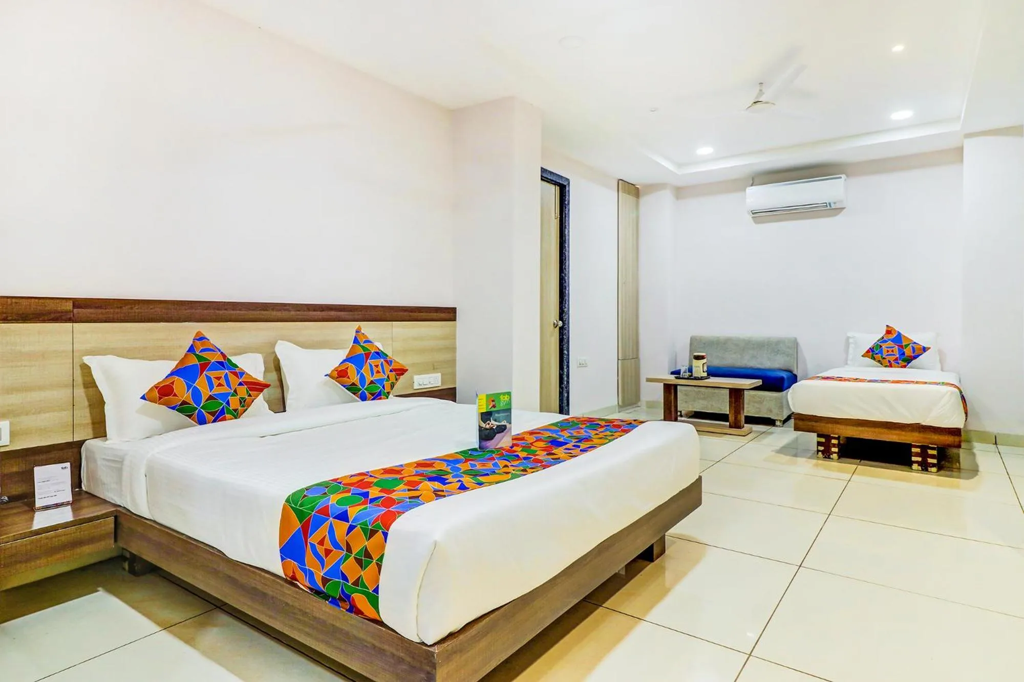 Bed in FabHotel Meera Palace