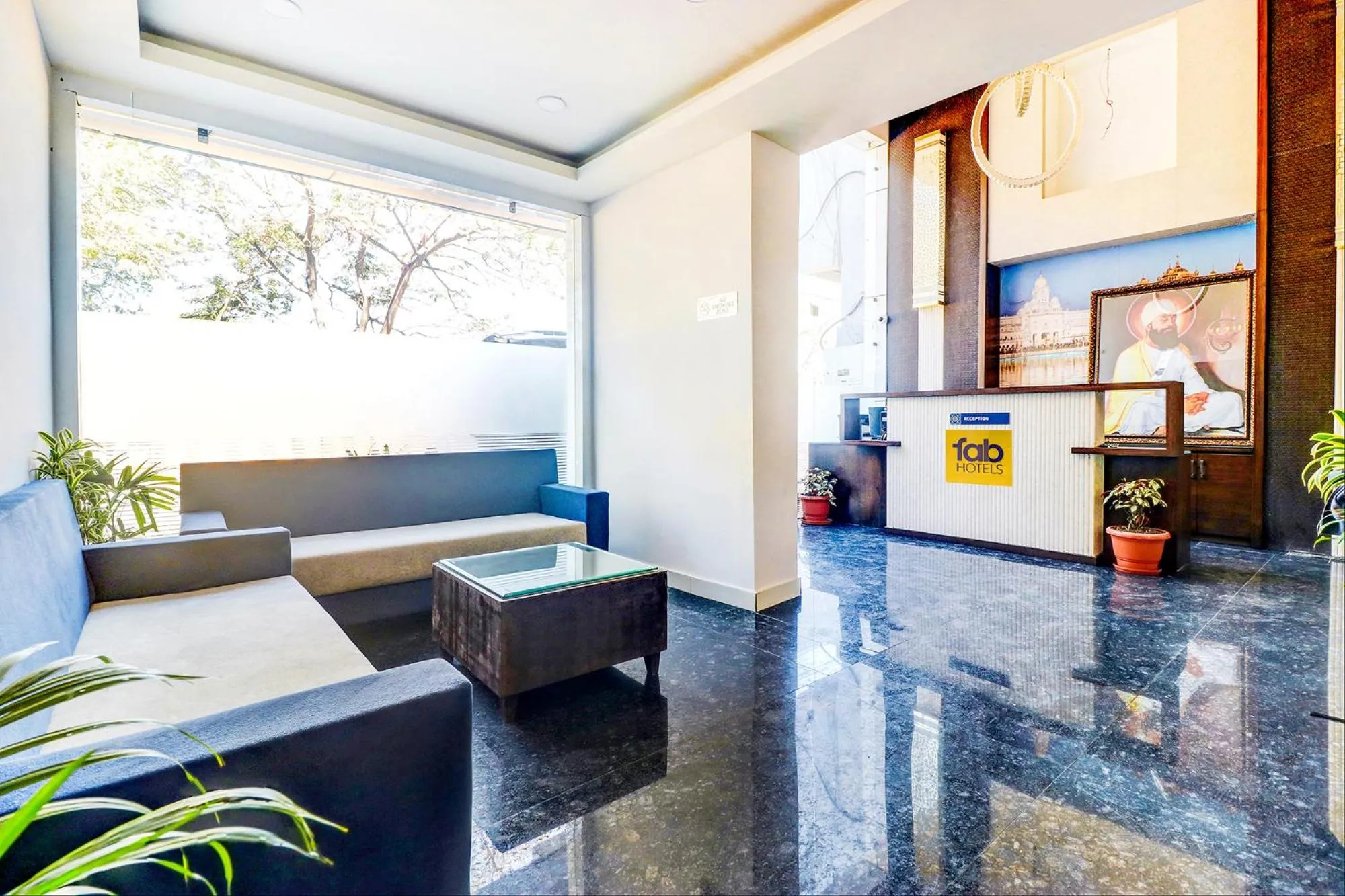 Seating area in FabHotel Meera Palace