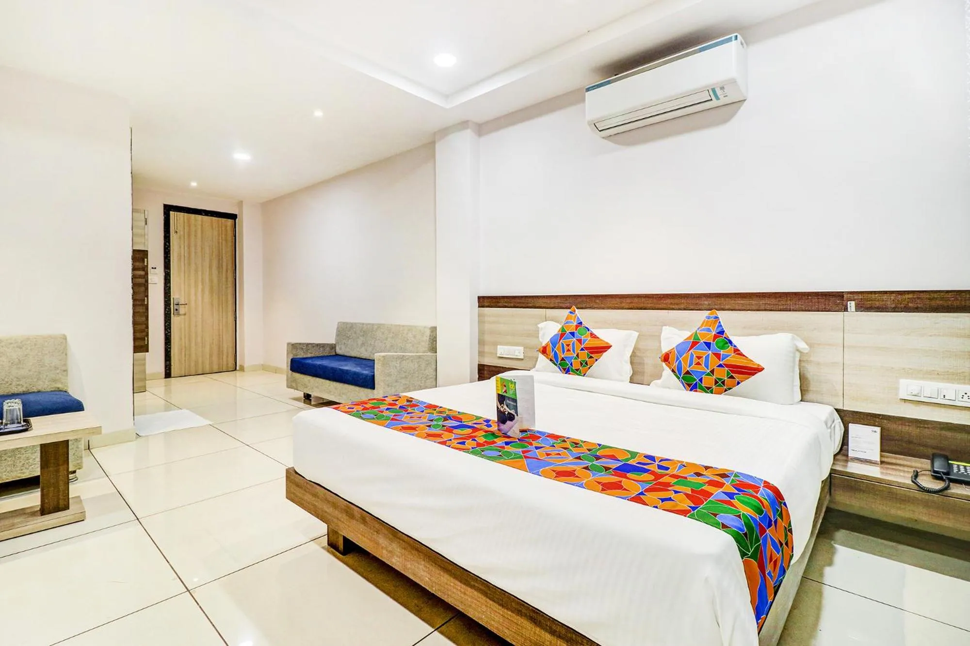 Bed in FabHotel Meera Palace