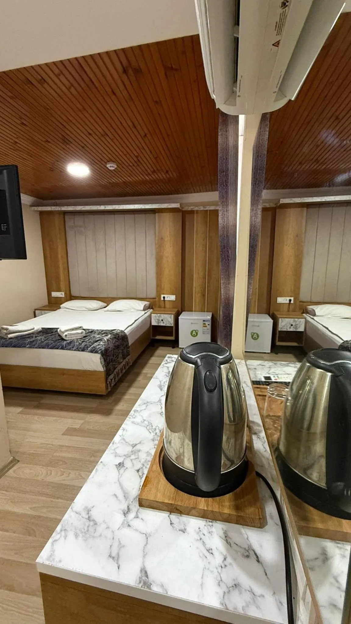 Bed in Han Suite Hotel