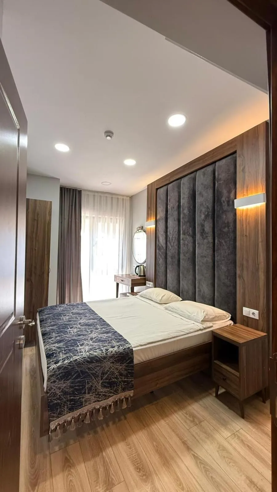 Bed in Han Suite Hotel