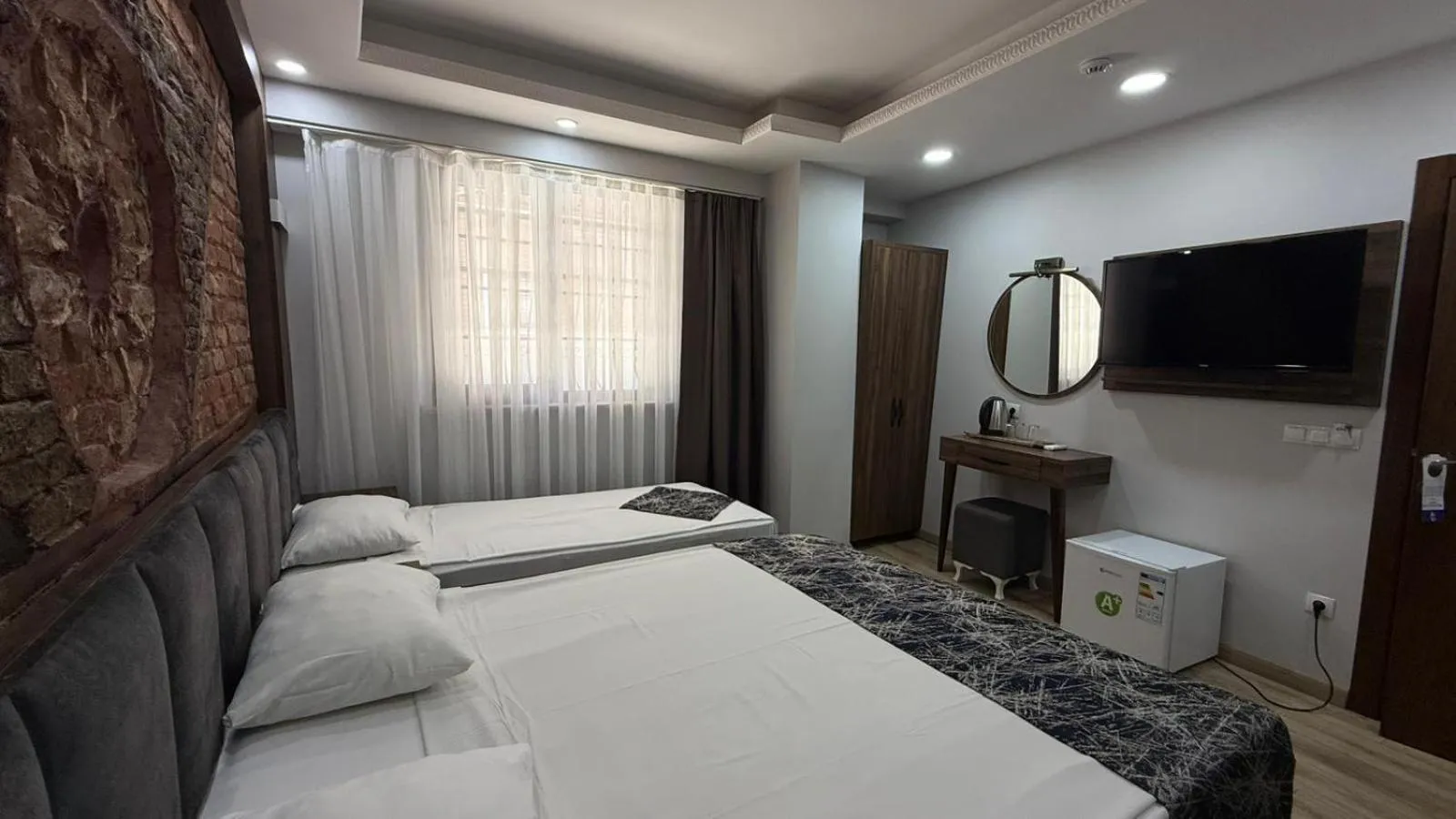 Bed in Han Suite Hotel