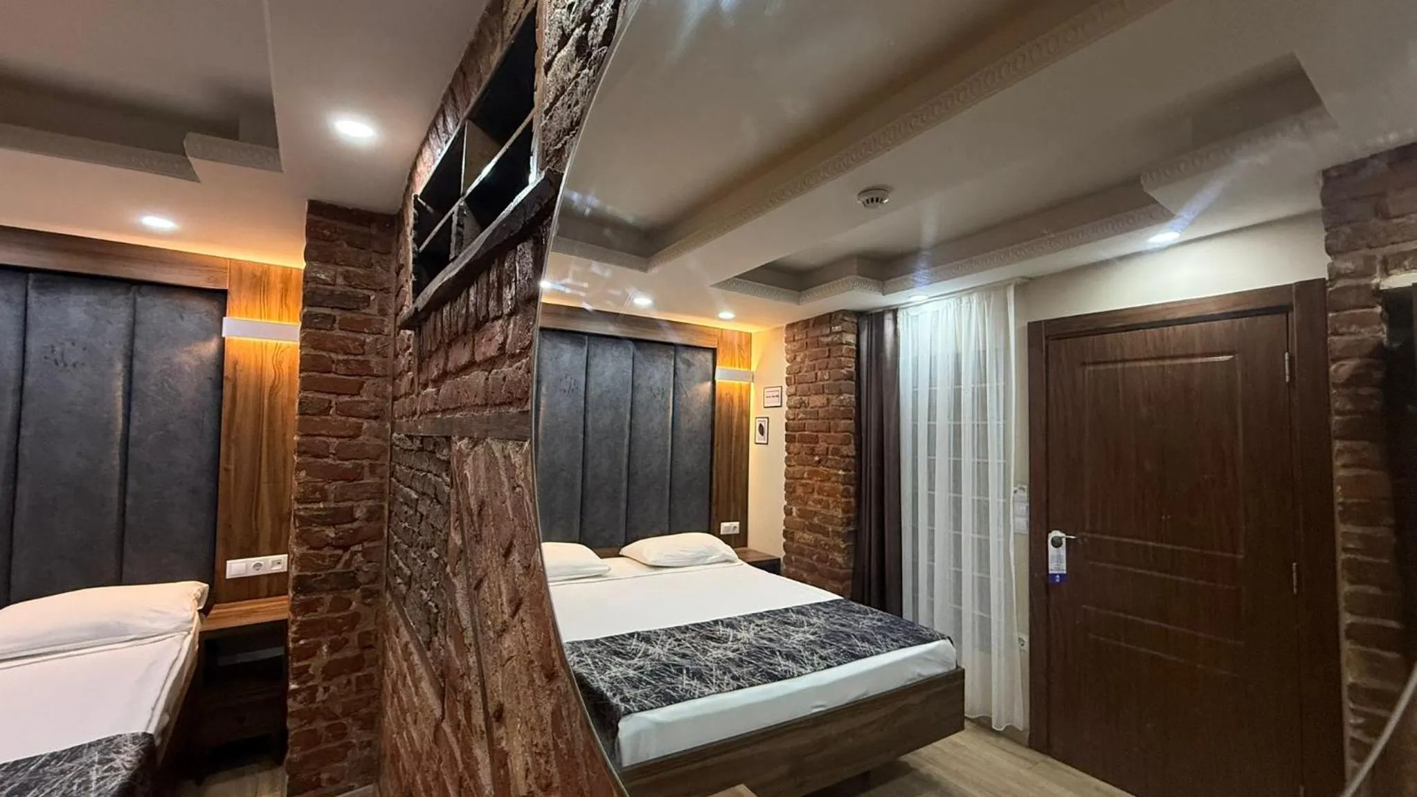 Bed in Han Suite Hotel