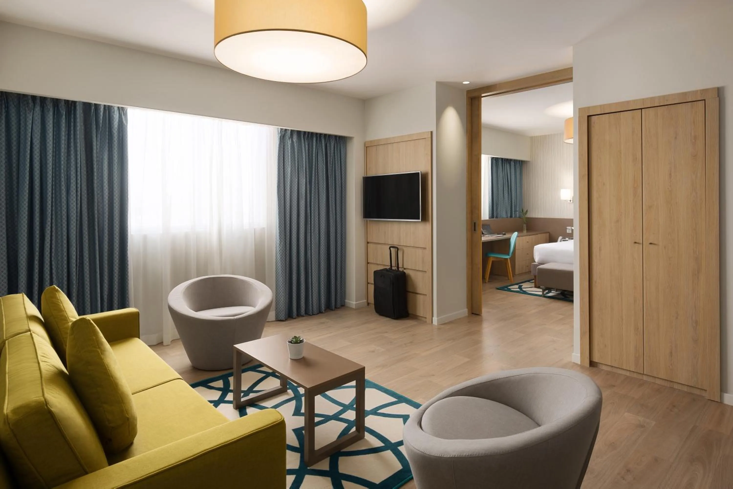 Living room, Bed in ibis Jeddah City Center