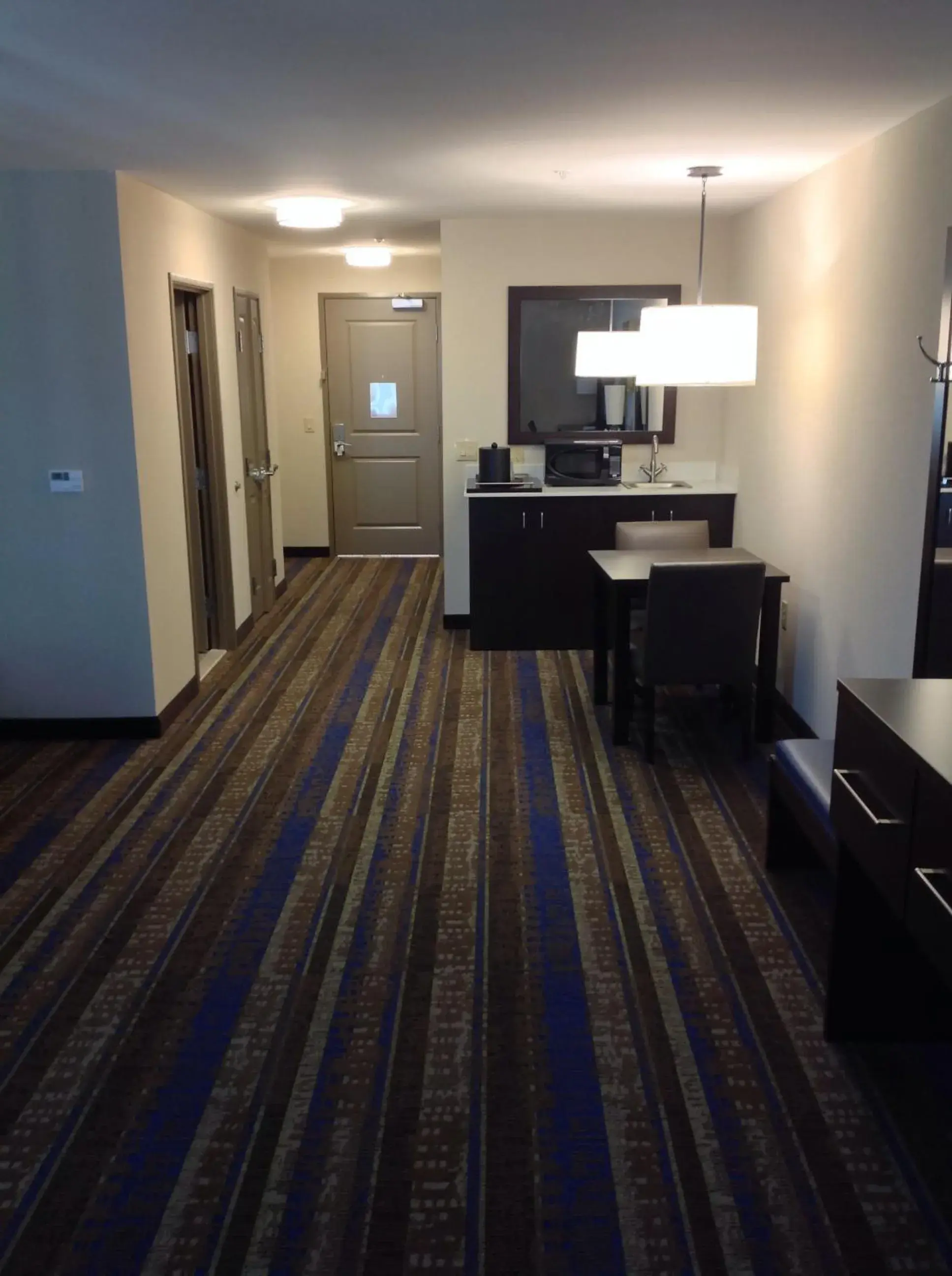 Bedroom in Holiday Inn & Suites Tupelo North by IHG Bedroom in Holiday Inn & Suites Tupelo North by IHG