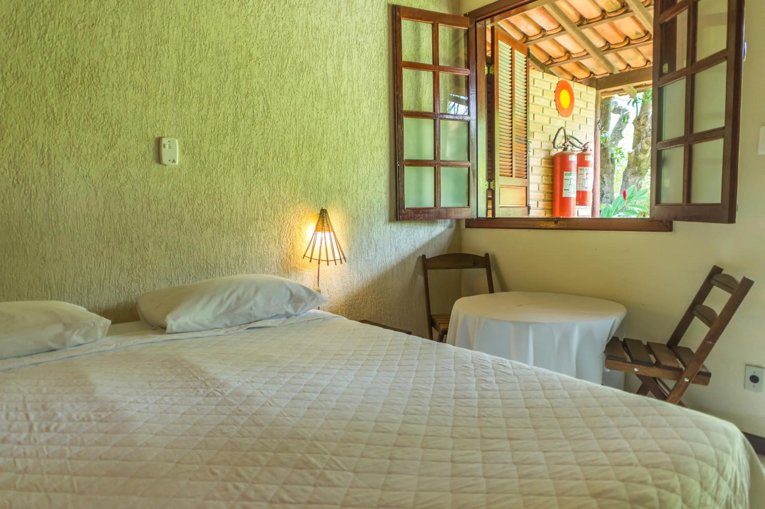 Bed in Pousada Chão da Serra