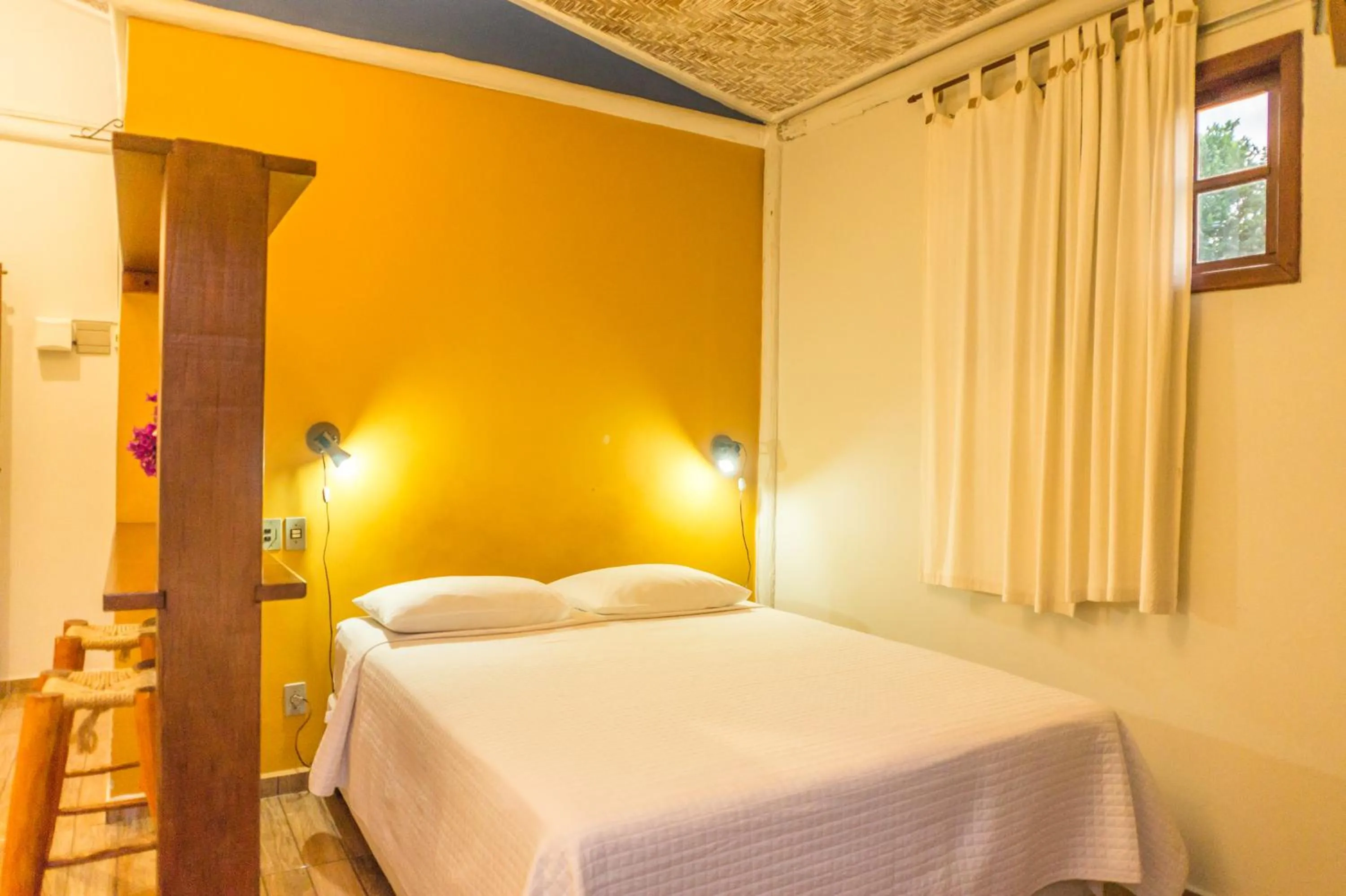 Bed in Pousada Chão da Serra