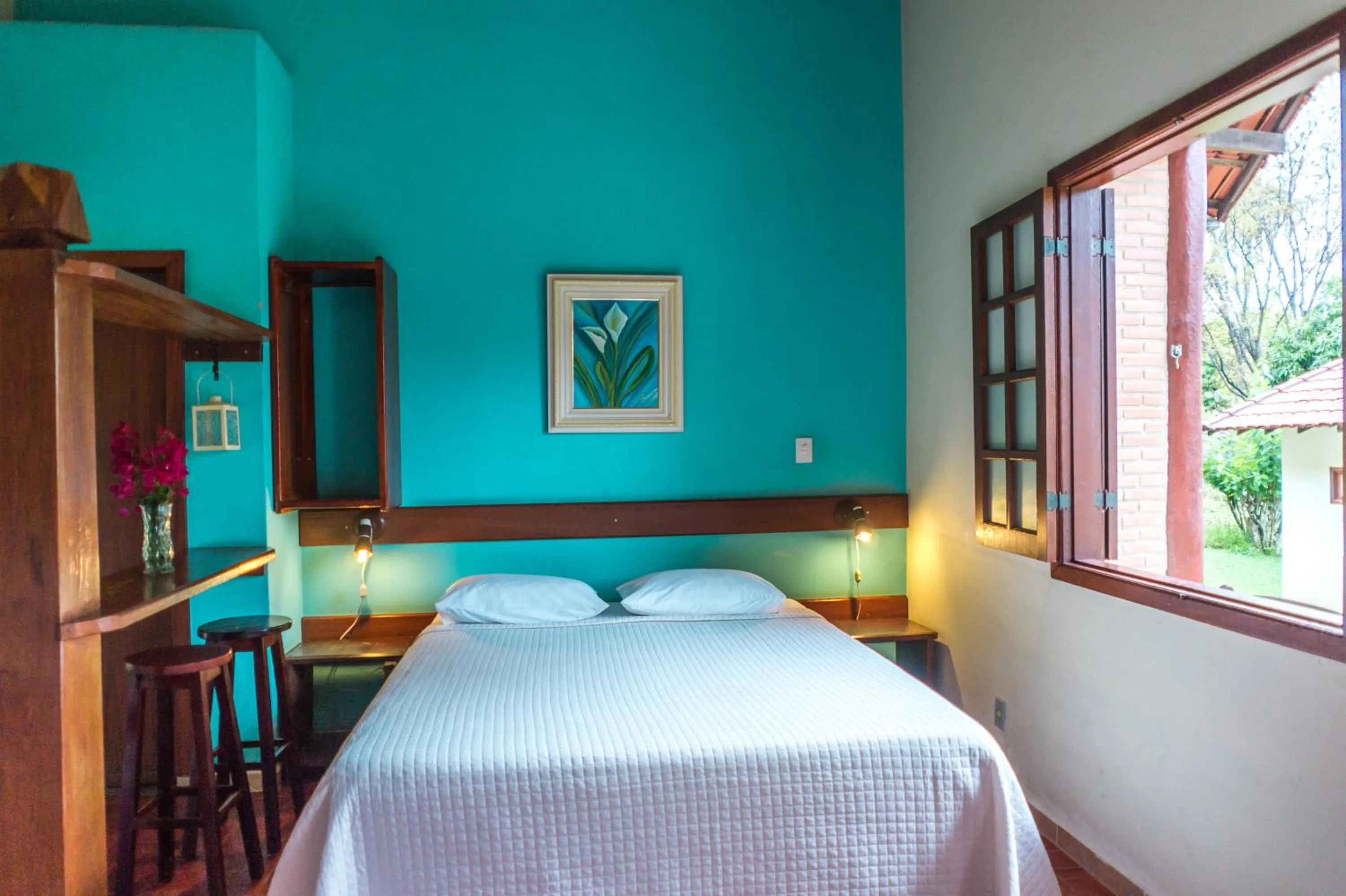 Bed in Pousada Chão da Serra