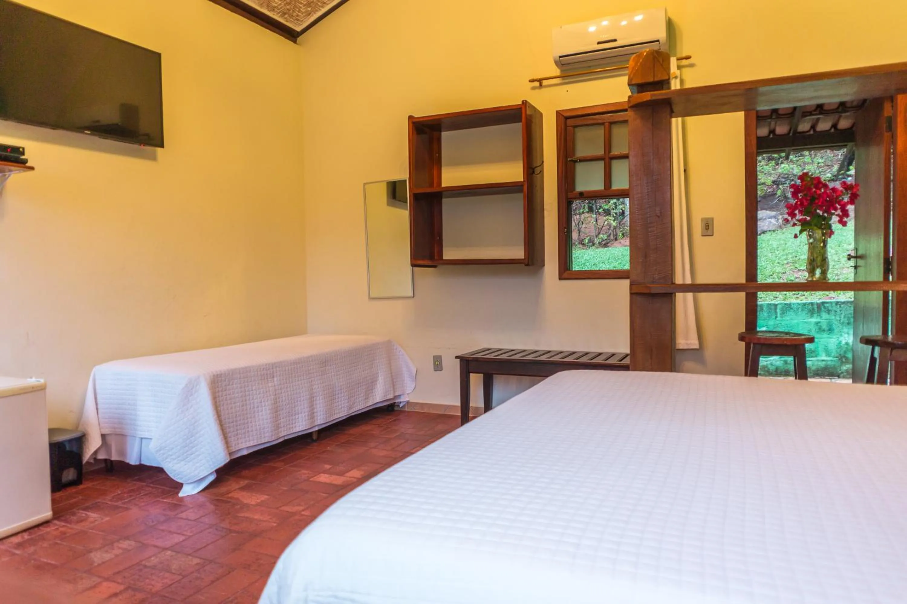 Bed in Pousada Chão da Serra