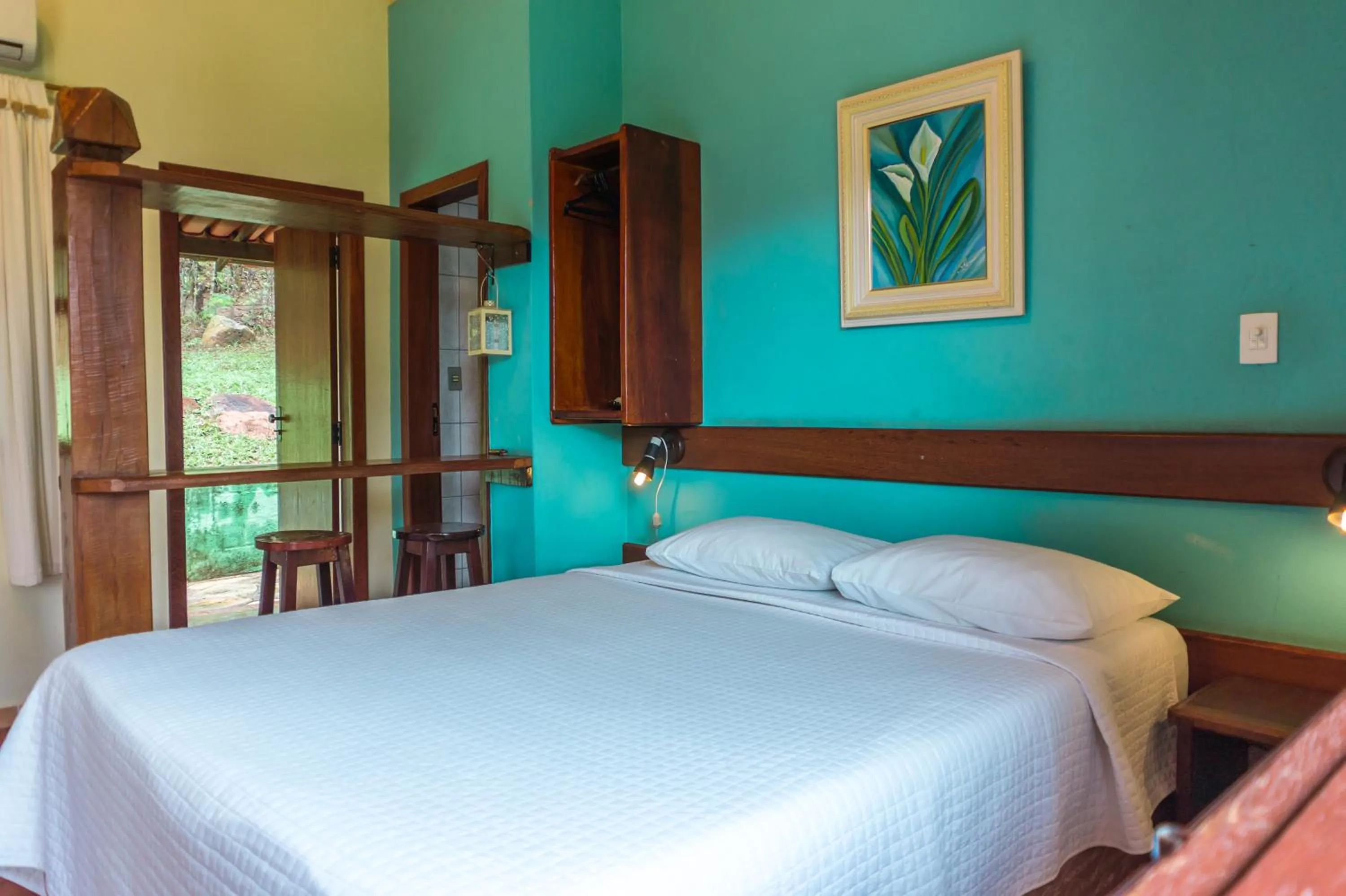 Bed in Pousada Chão da Serra