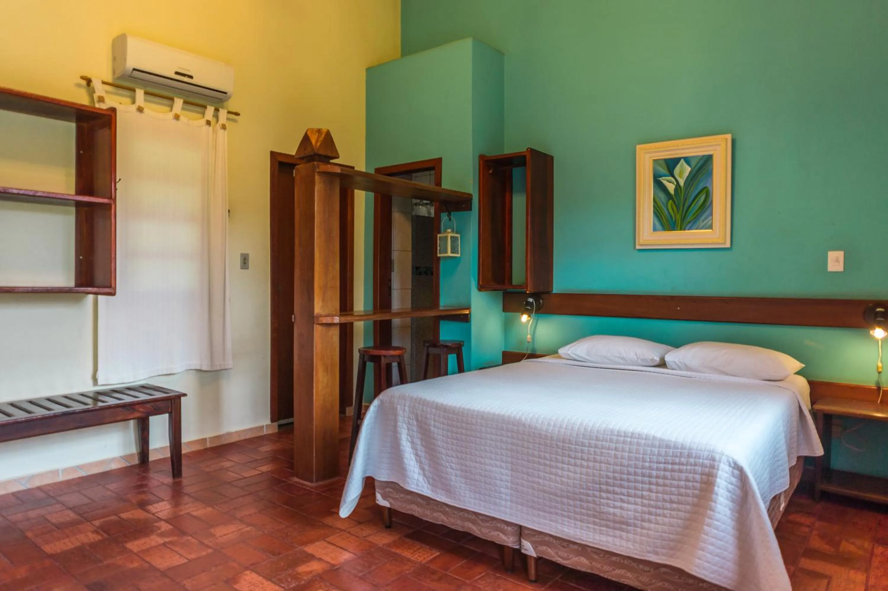 Bed in Pousada Chão da Serra