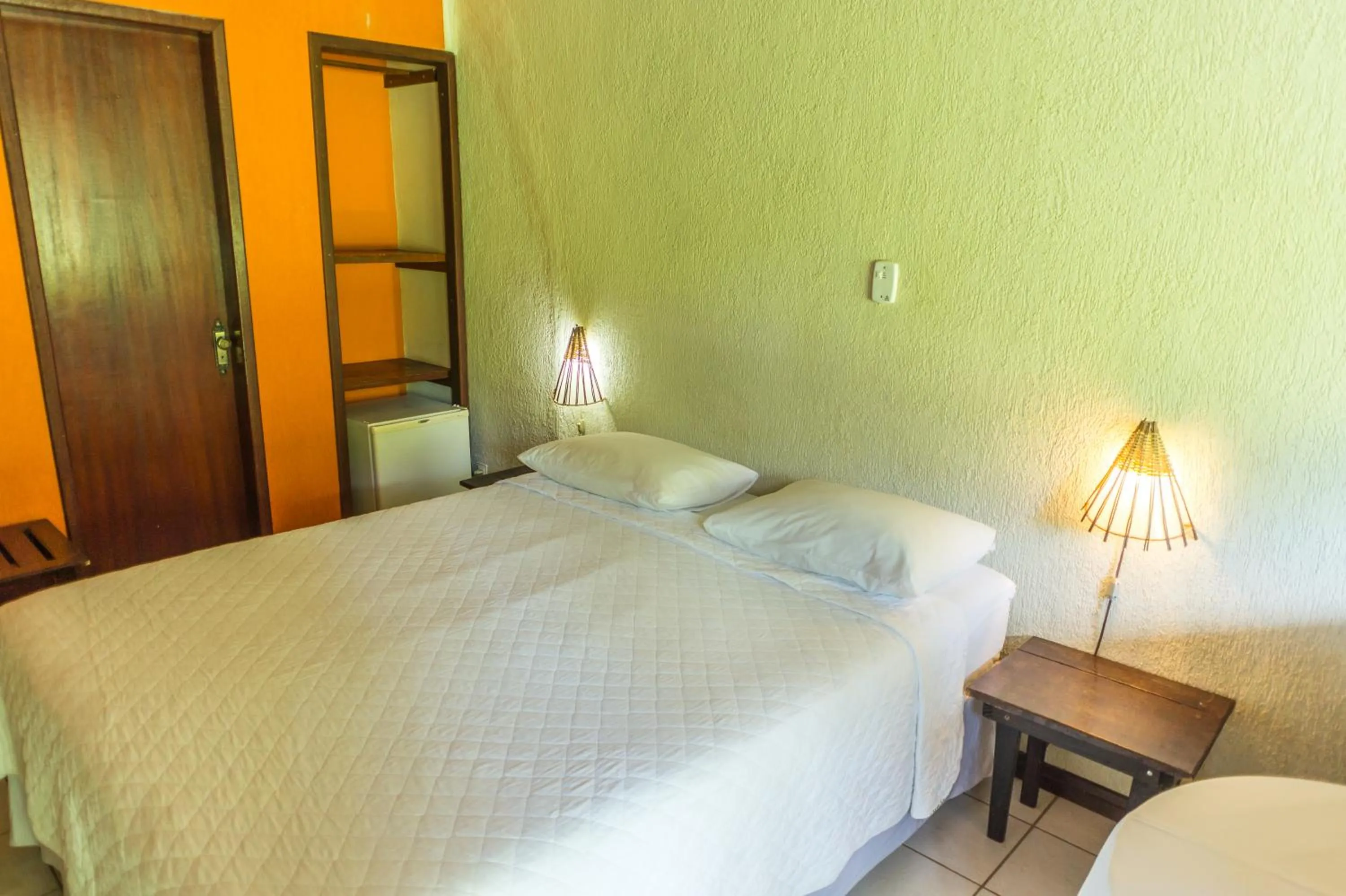 Bed in Pousada Chão da Serra