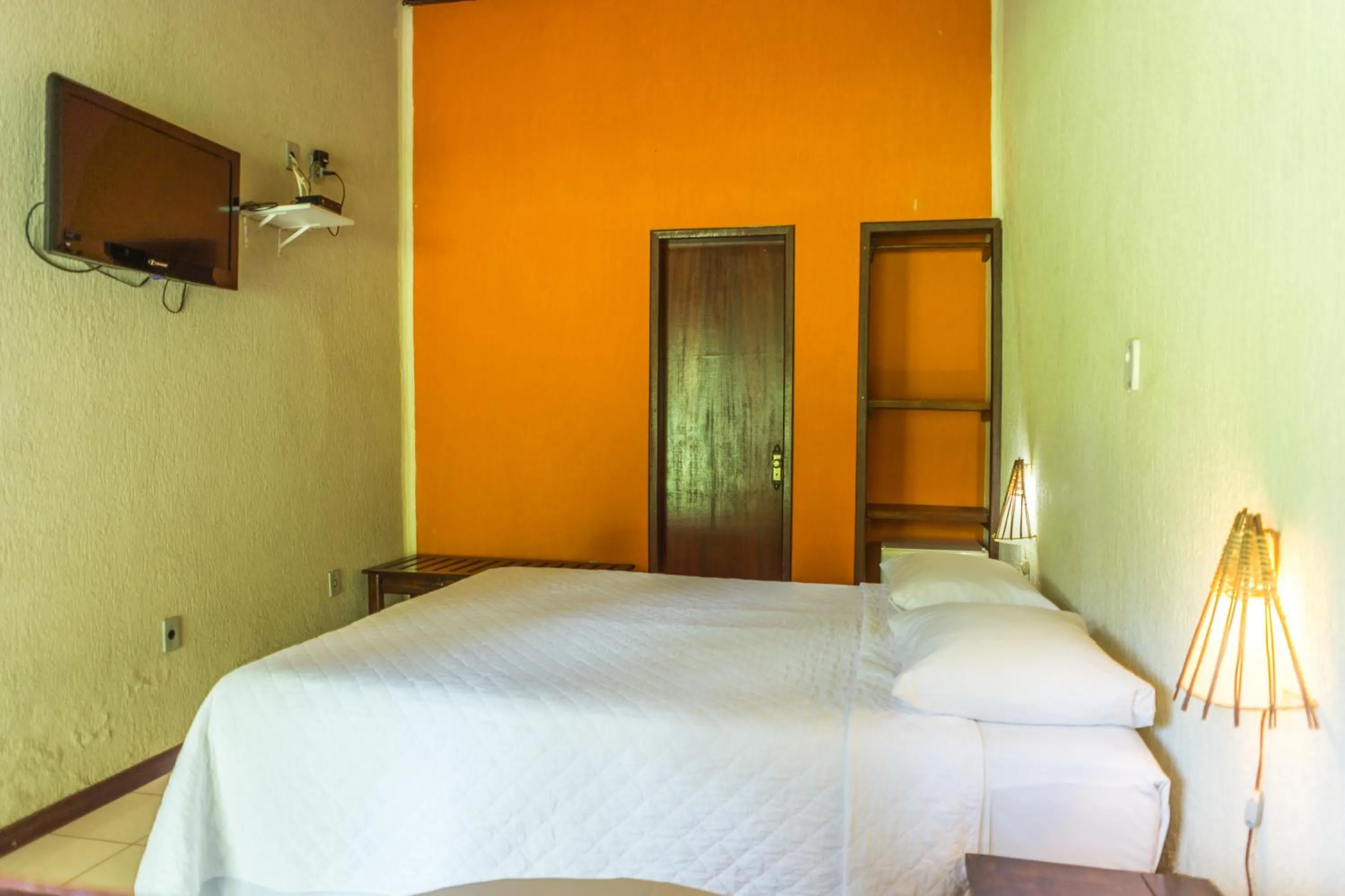 Bed in Pousada Chão da Serra