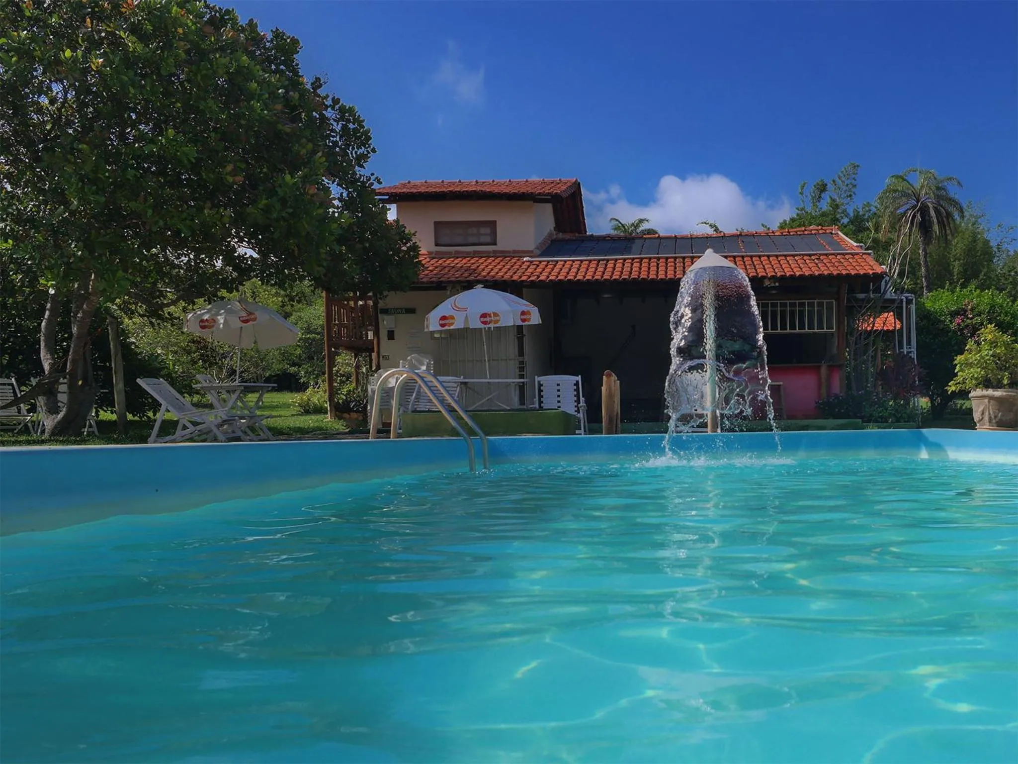 Swimming pool in Pousada Chão da Serra