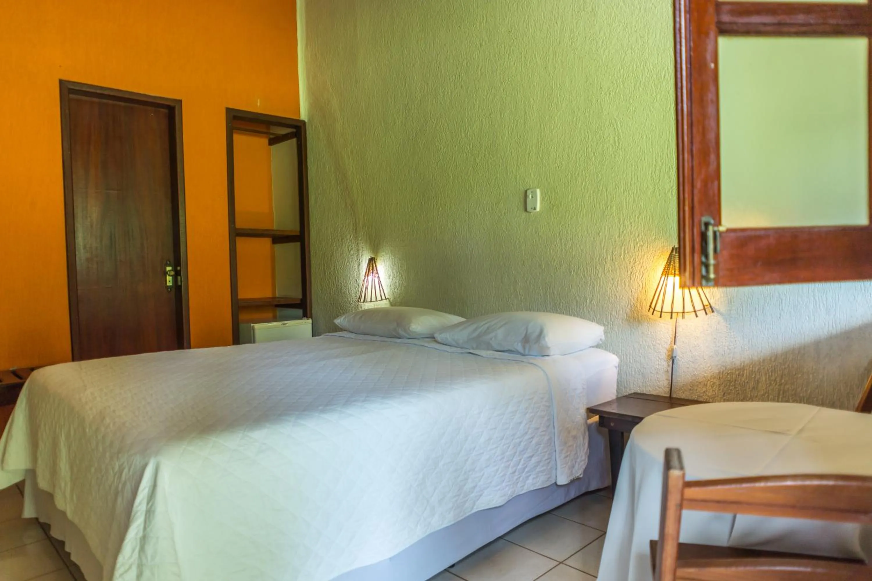 Bed in Pousada Chão da Serra