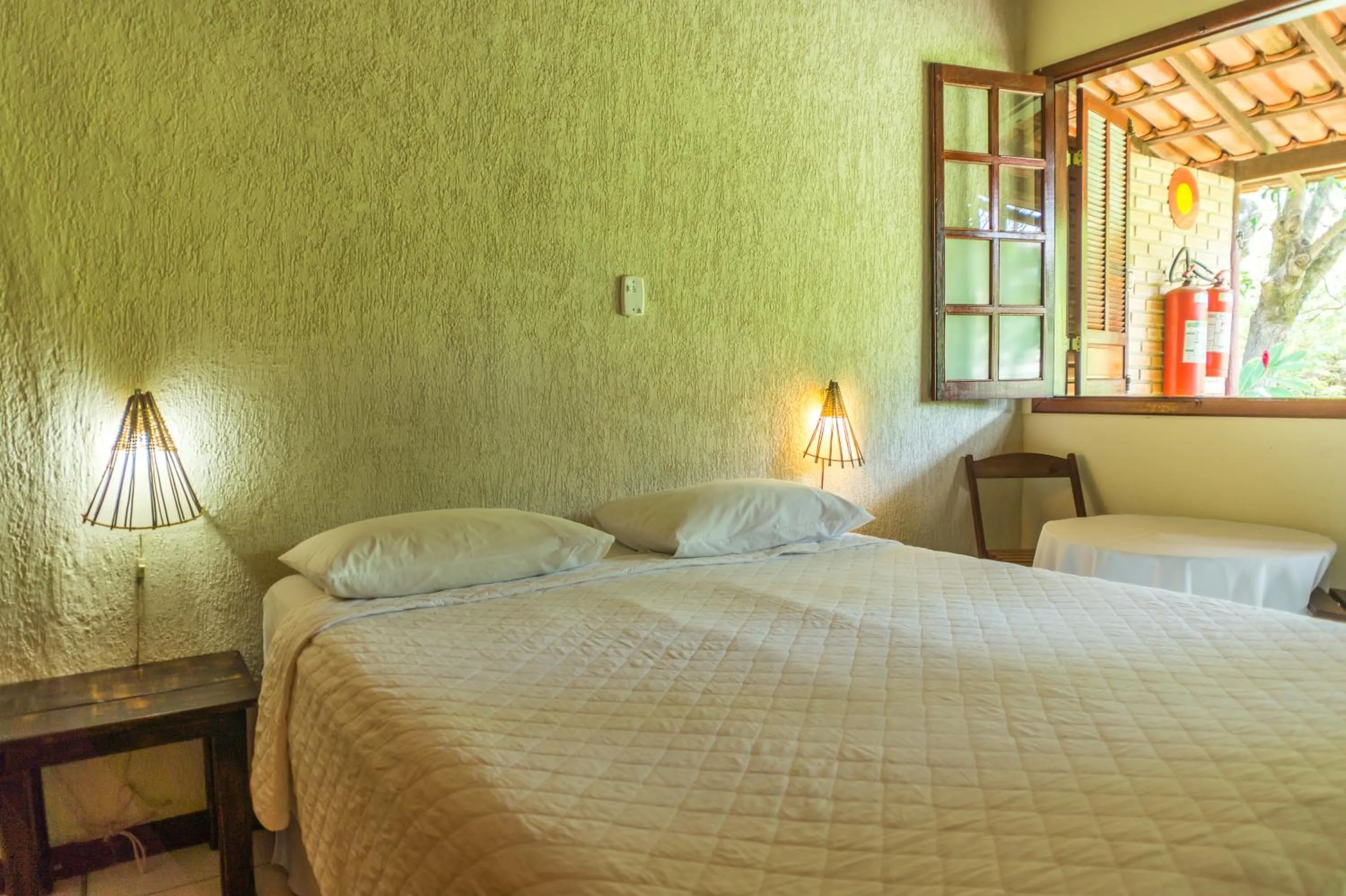 Bed in Pousada Chão da Serra
