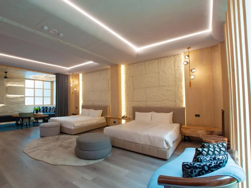 Bed in 沐蘭精品旅館-台中館 Mulan Boutique Hotel