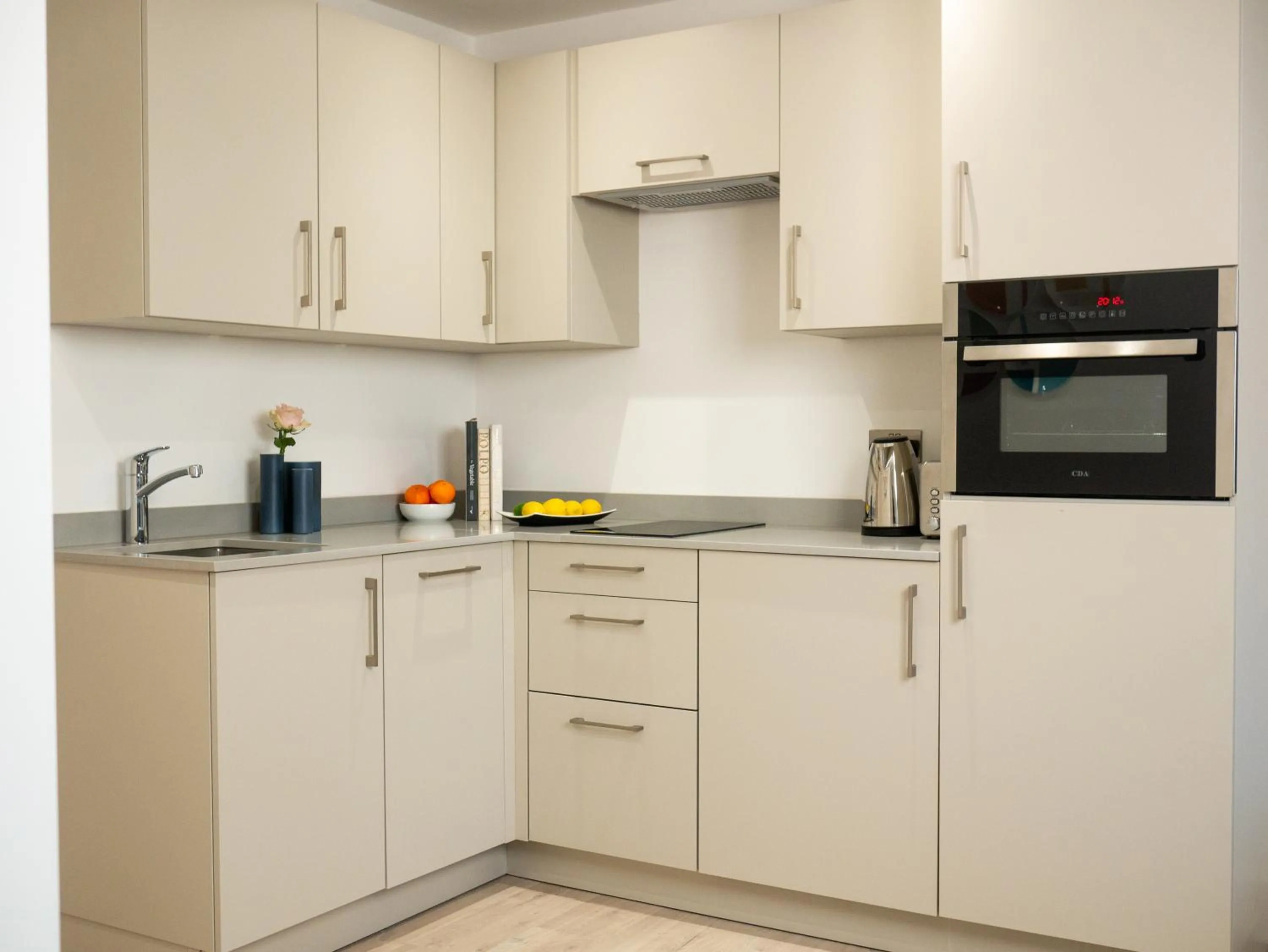 Kitchen or kitchenette in Q Square by Supercity Aparthotels