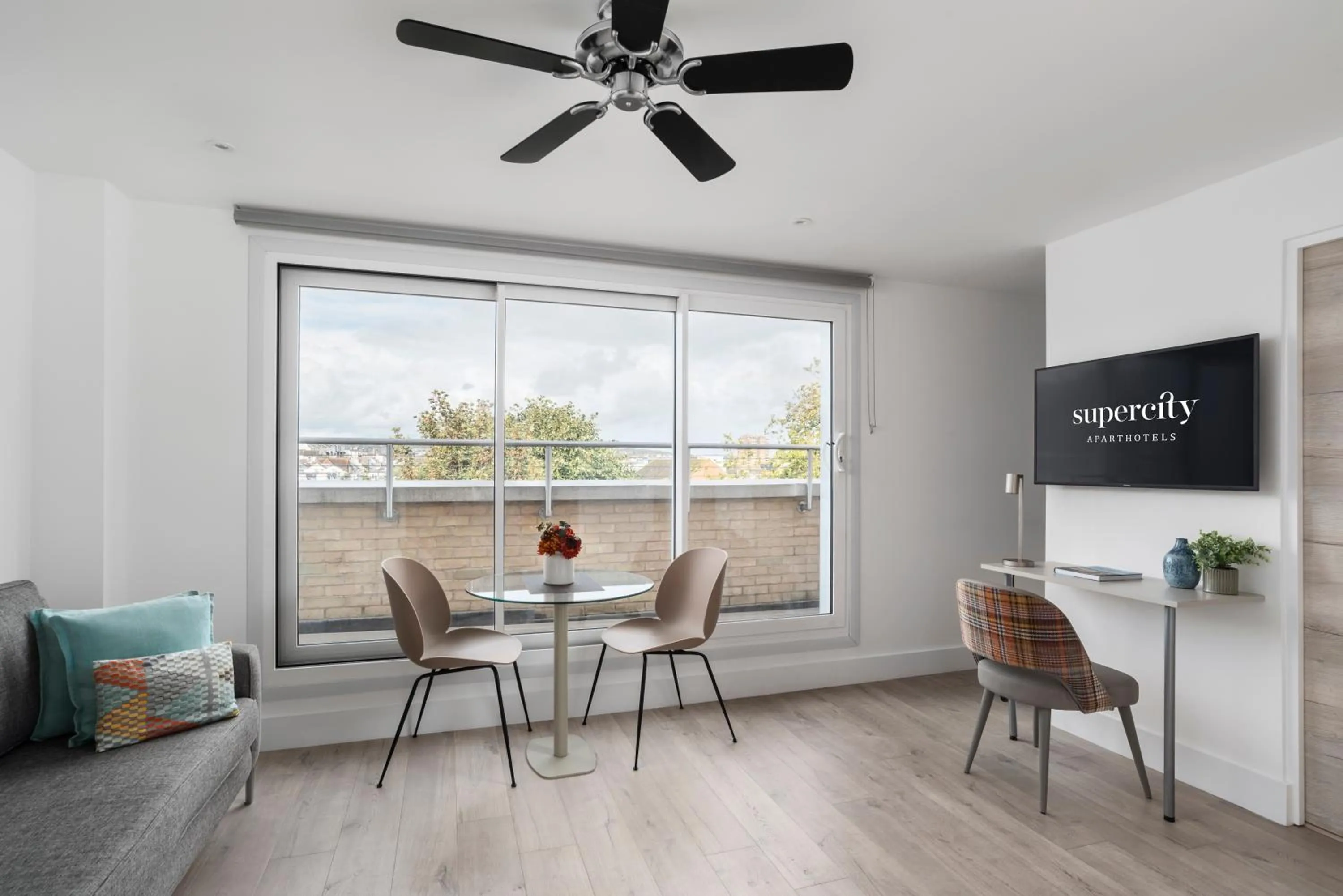 Living room in Q Square by Supercity Aparthotels