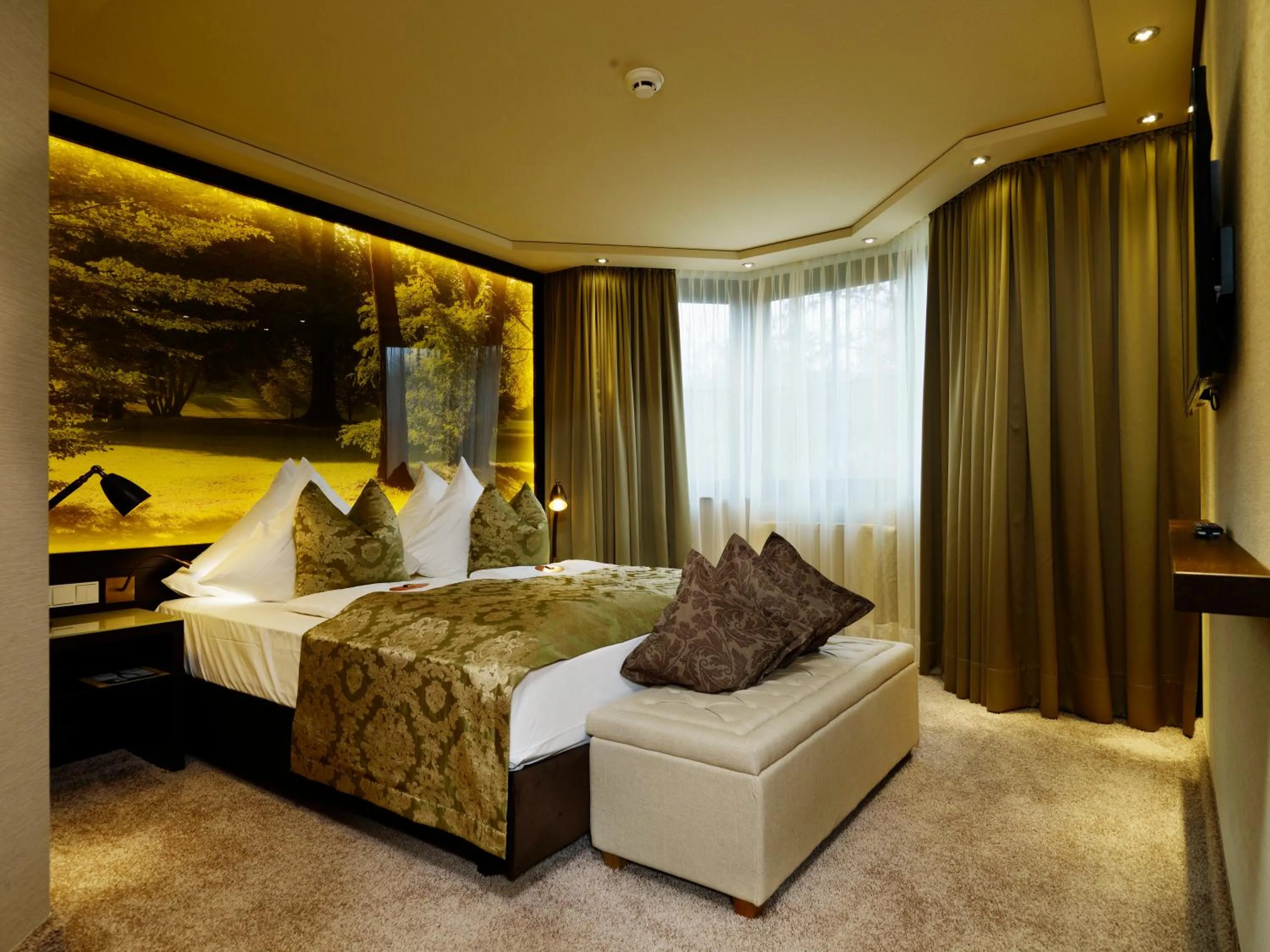 Bed in Land & Golf Hotel Stromberg