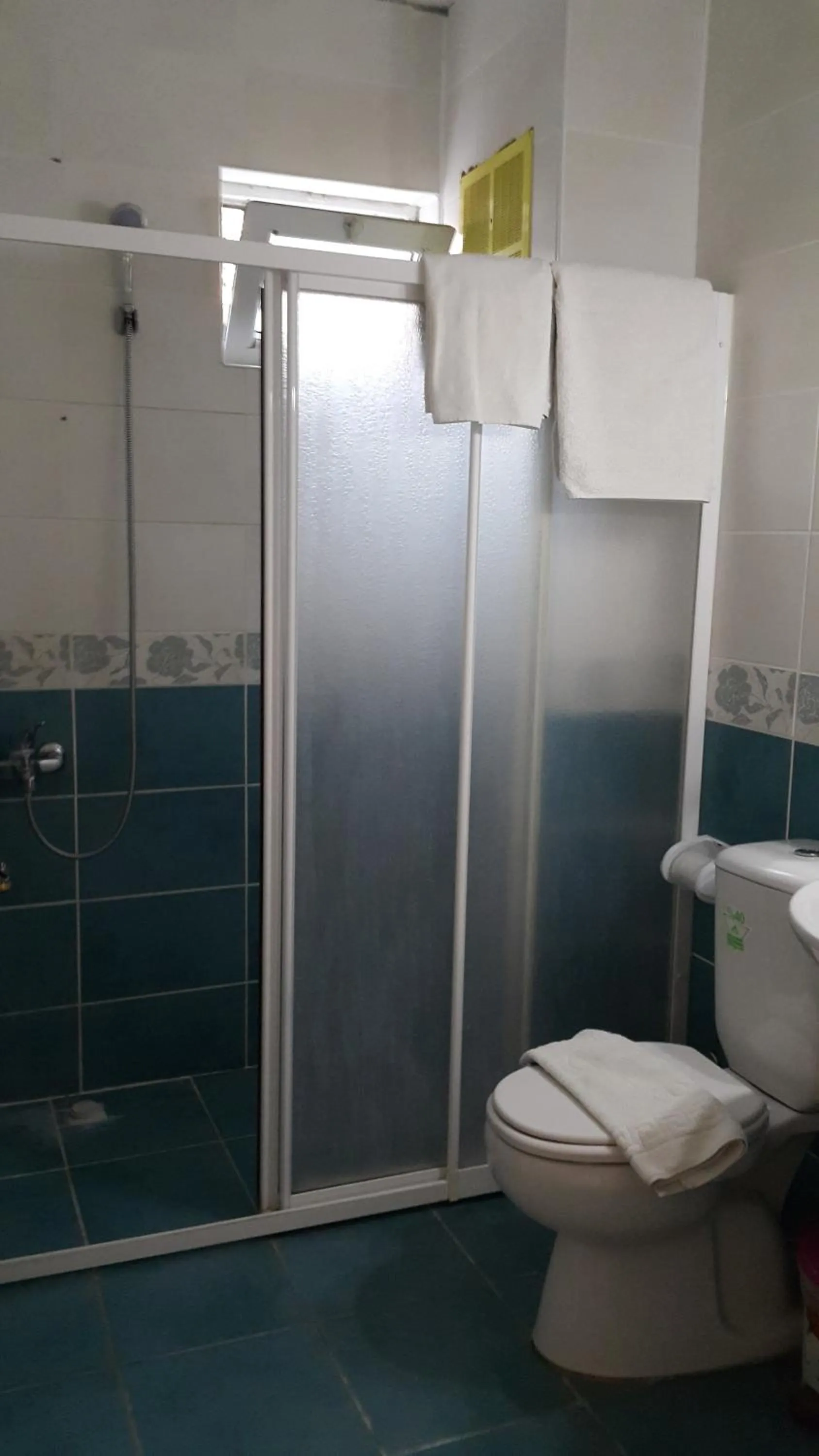 Bathroom in Delphin Apart Hotel