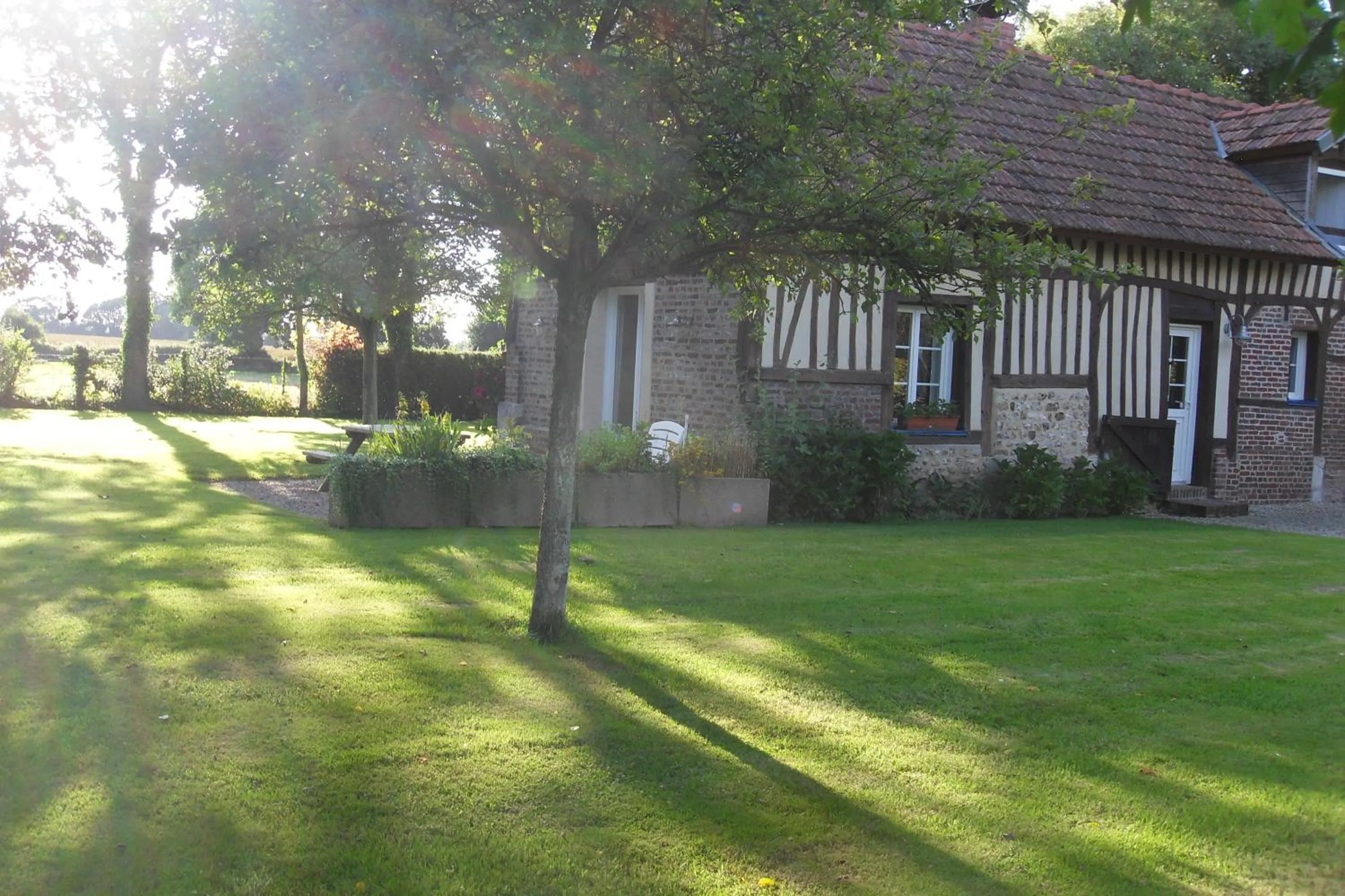 Garden in Gîtes Manoir du Buquet