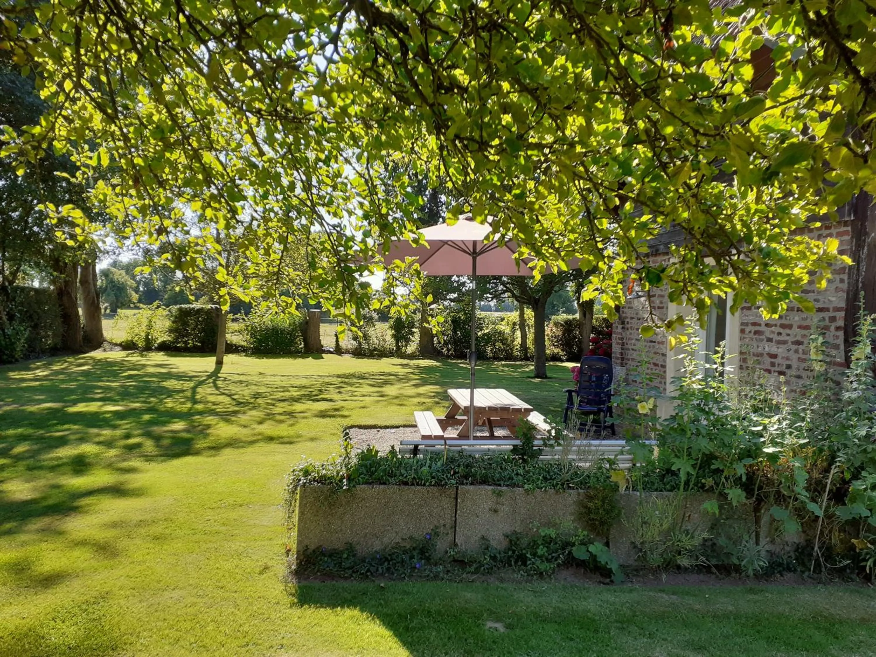 Garden in Gîtes Manoir du Buquet