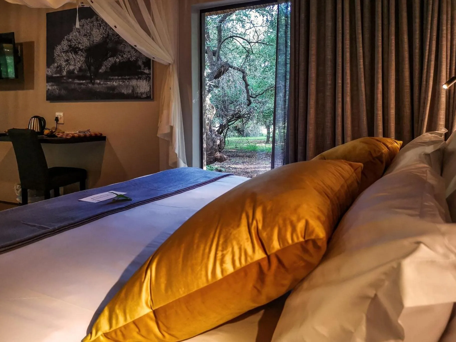 Bed in Kruger Eden Lodge
