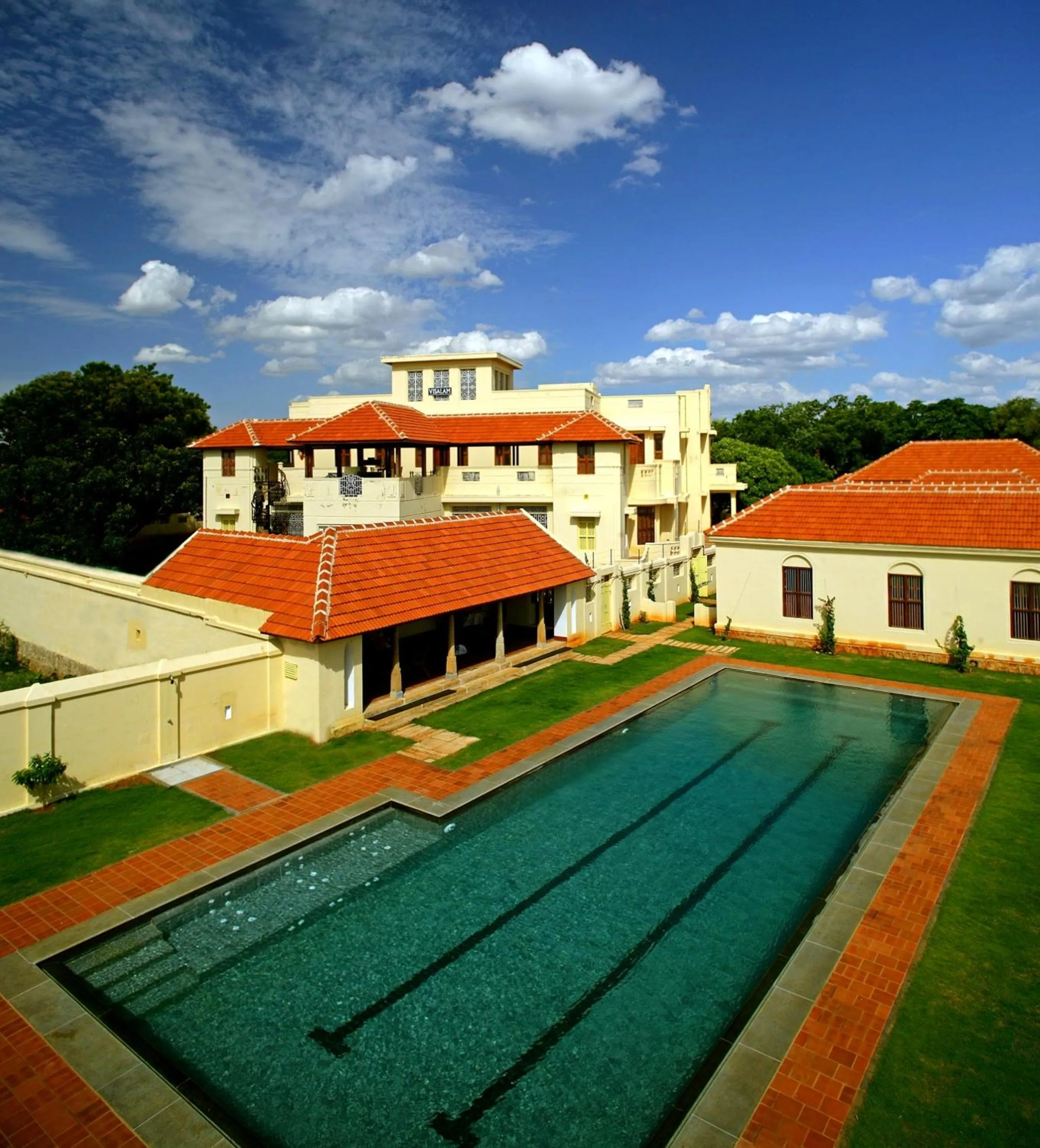 Swimming pool in Visalam Chettinad Palace - A CGH Earth Experience