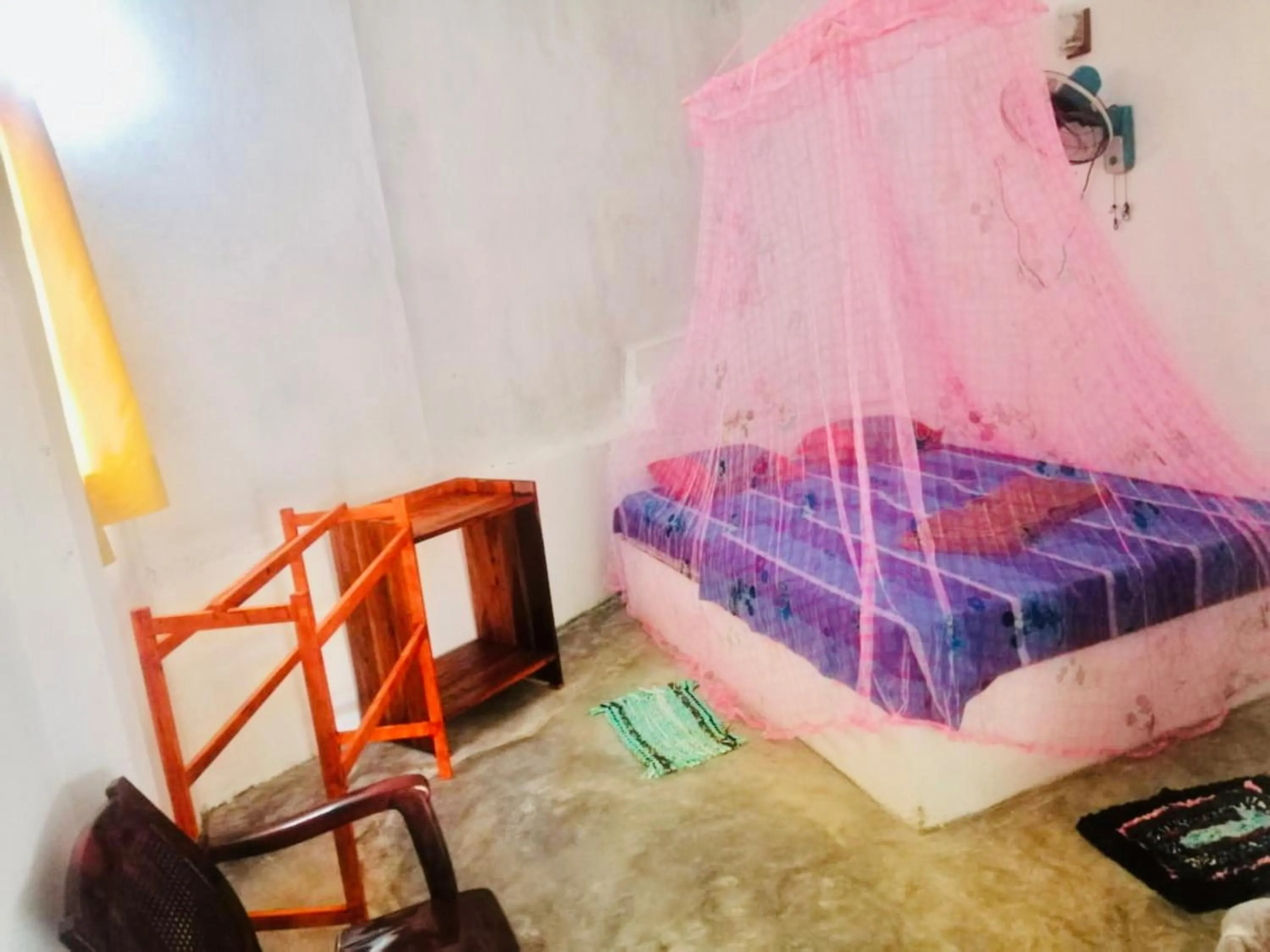 Bed in Hiriketiya Orchid Villa