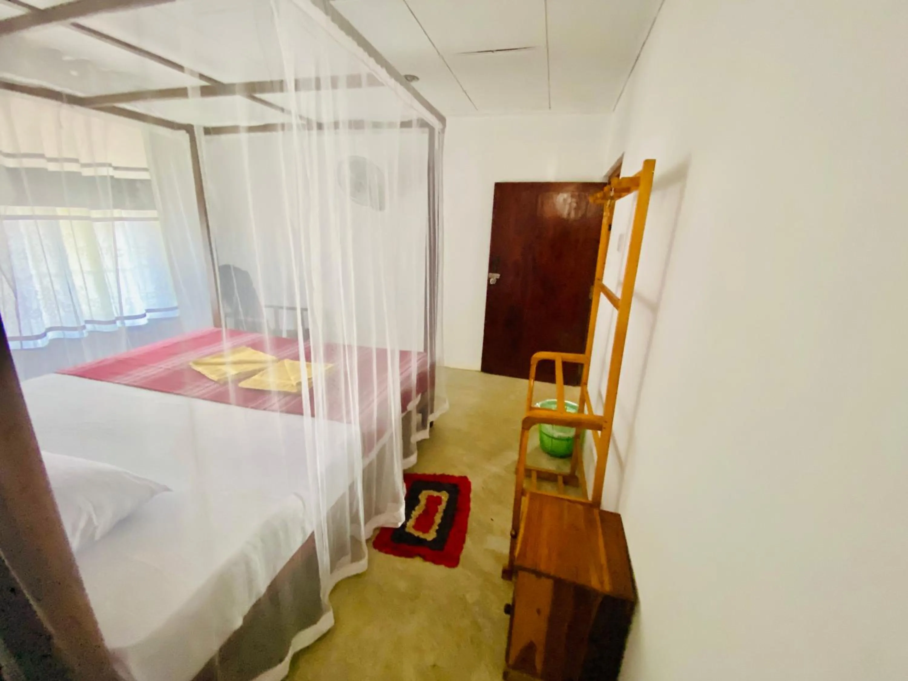 Bedroom in Hiriketiya Orchid Villa