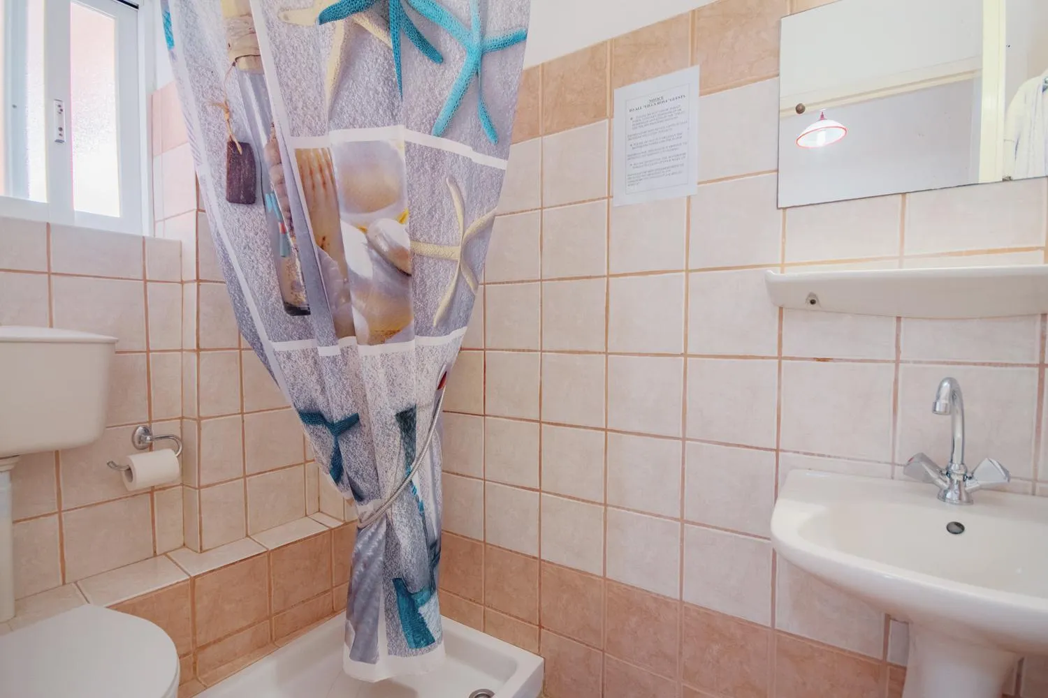 Shower in Villa Rosa Apartments