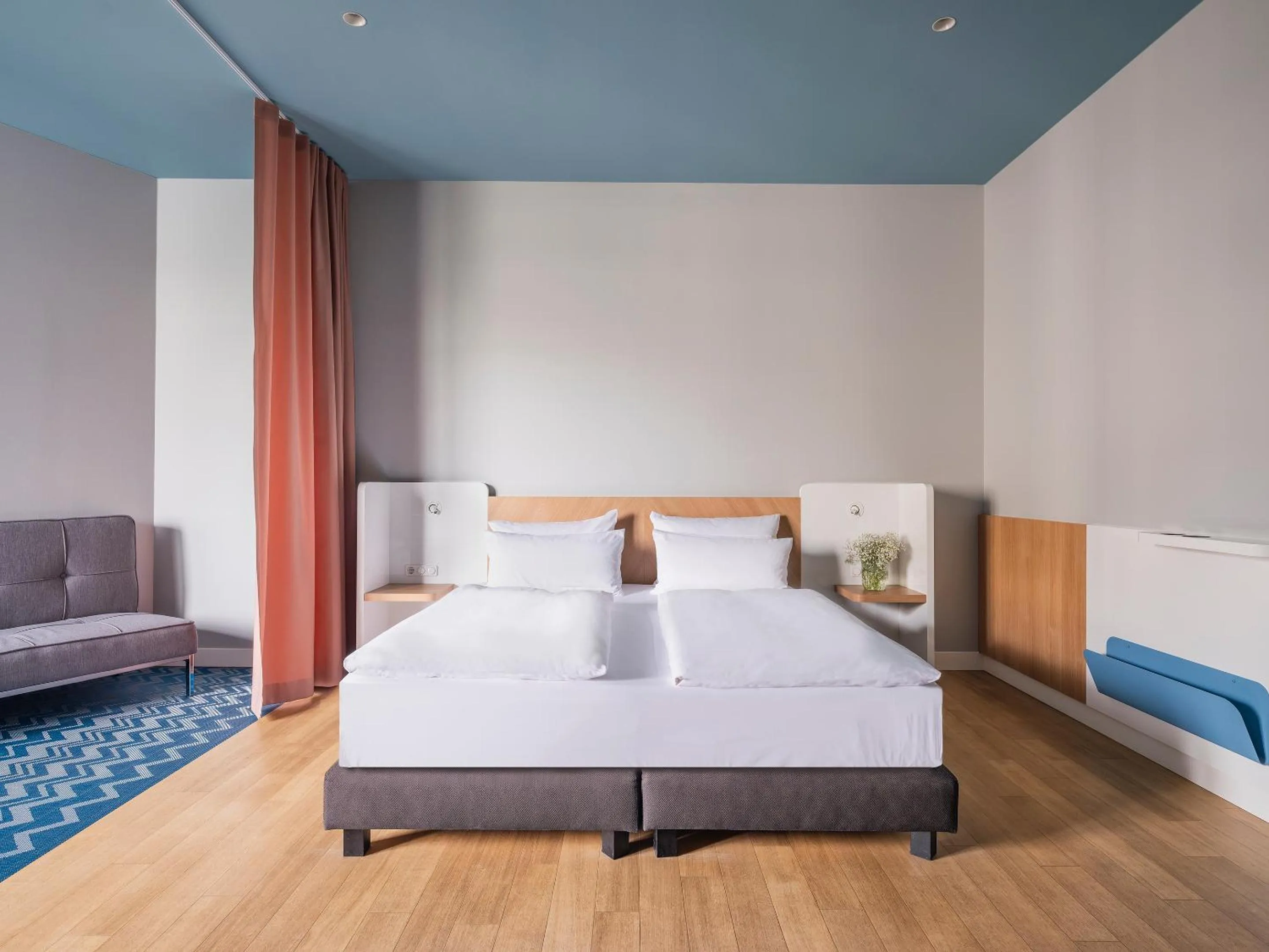 Bed in about:berlin Hotel