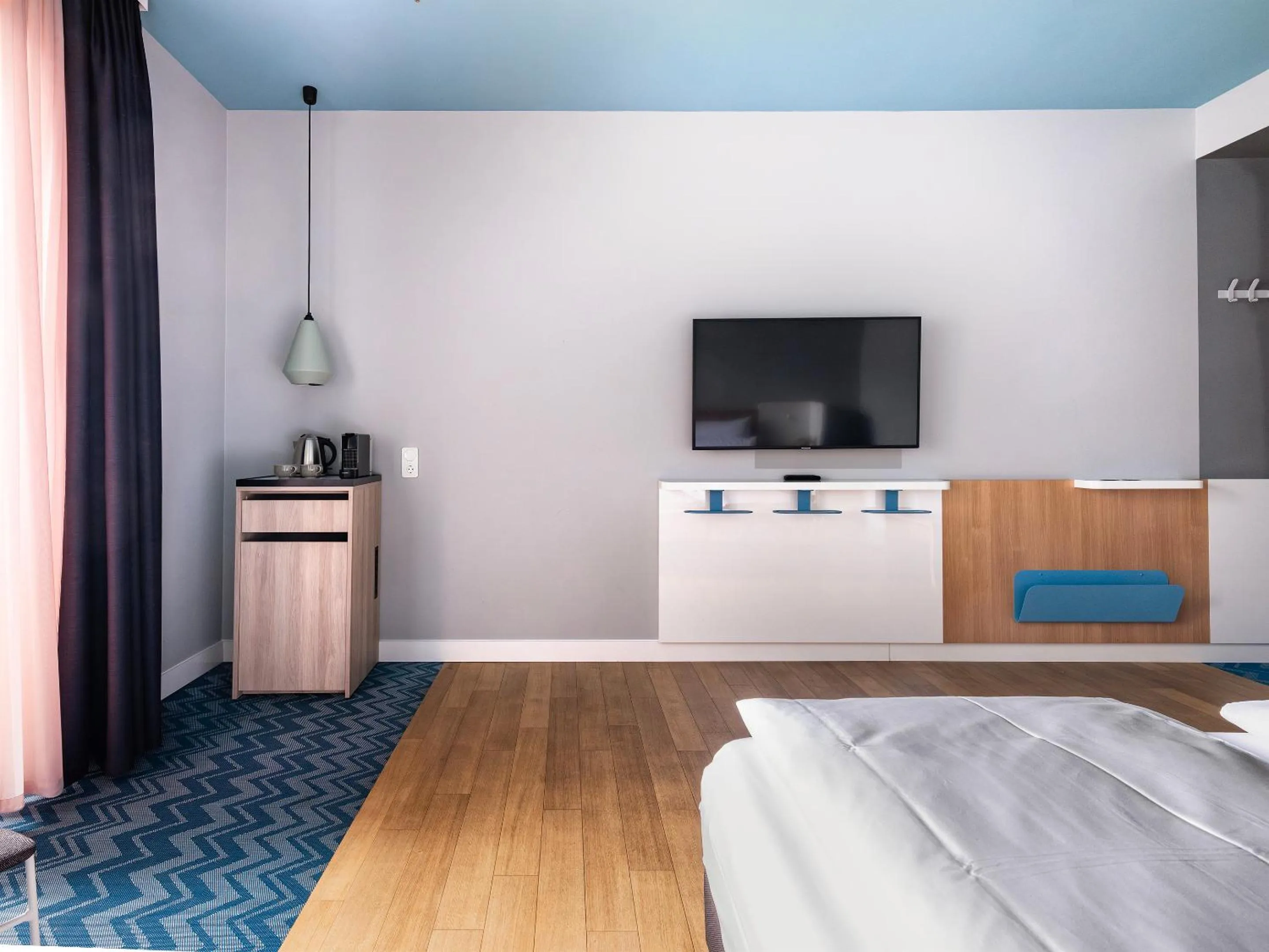 Bed in about:berlin Hotel