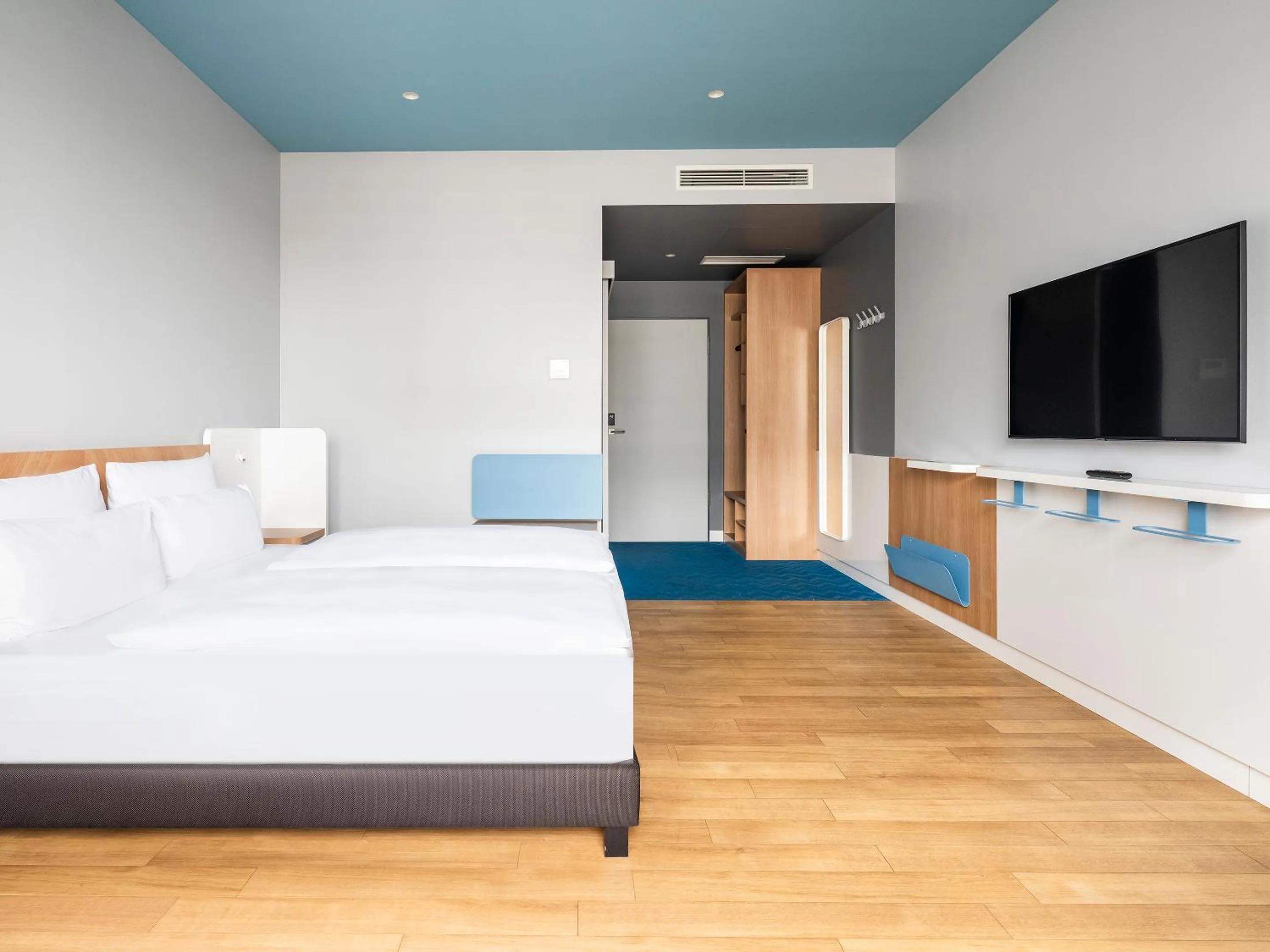 Bed in about:berlin Hotel