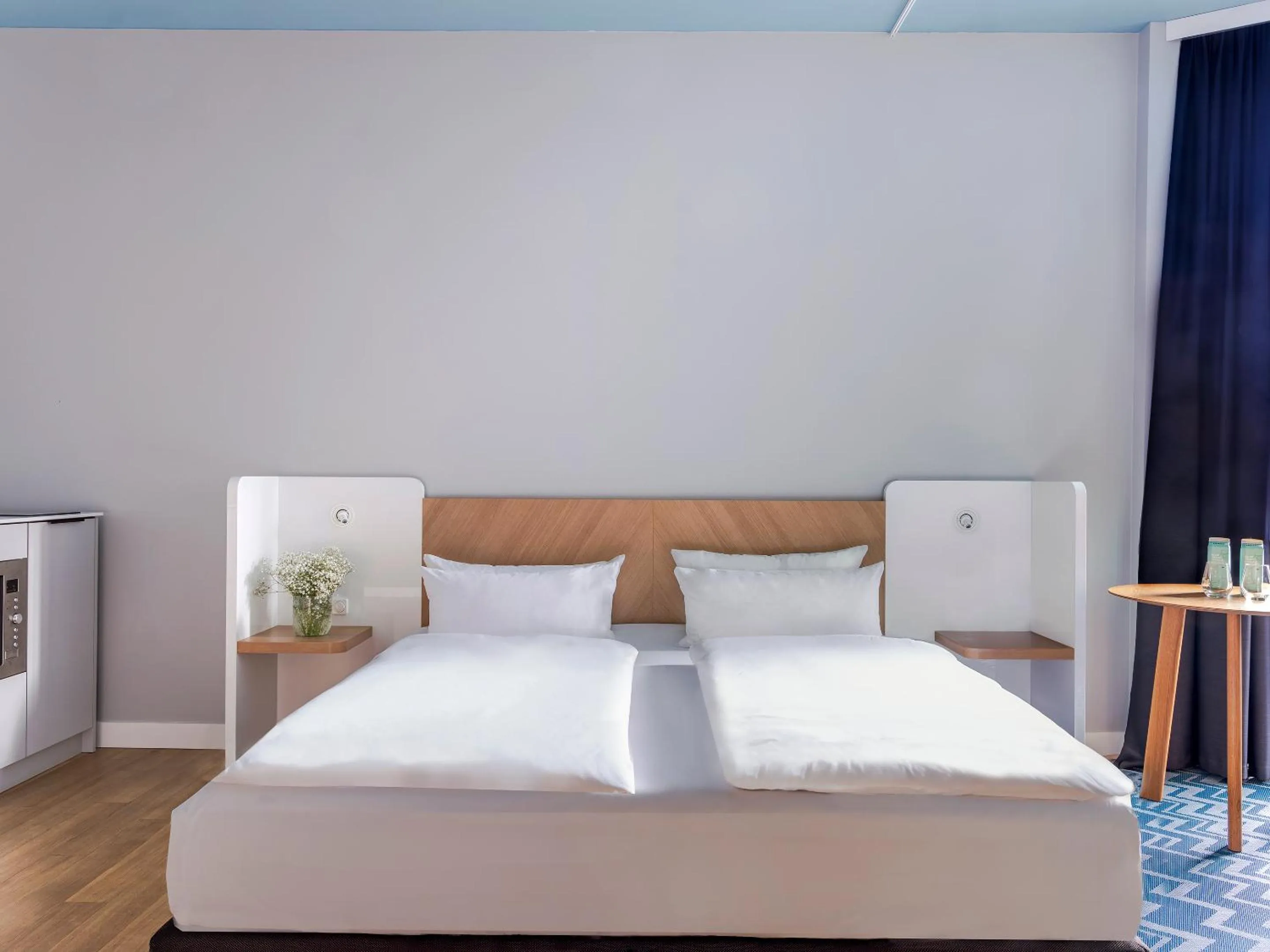 Bed in about:berlin Hotel