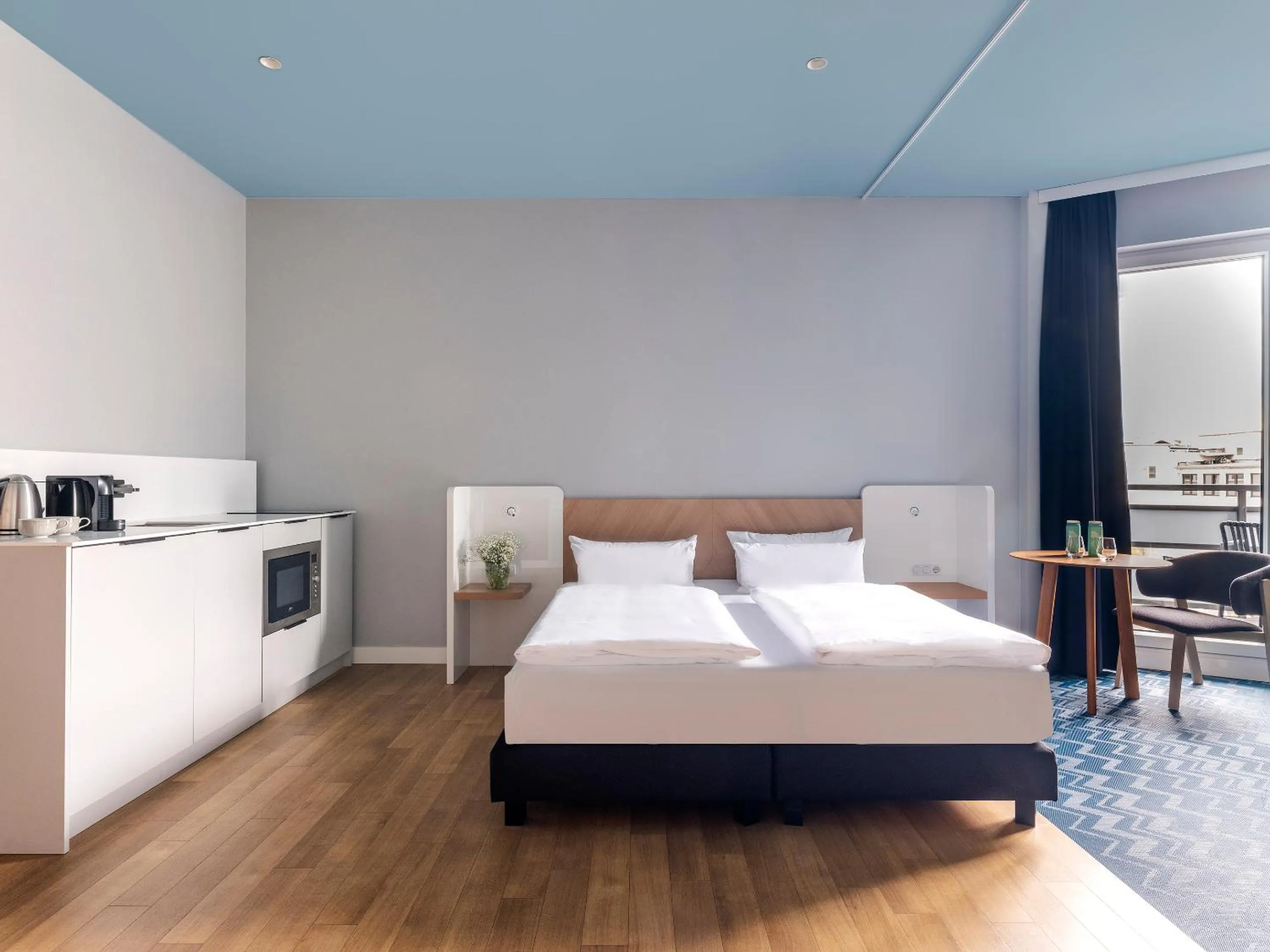 Bed in about:berlin Hotel