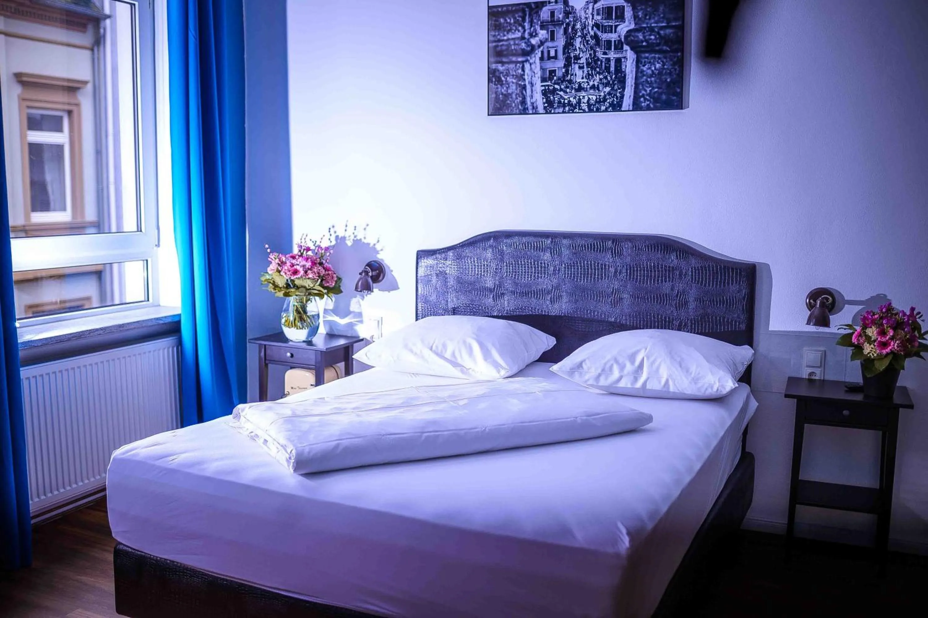 Bed in SmartHotel Mystique Self check-in