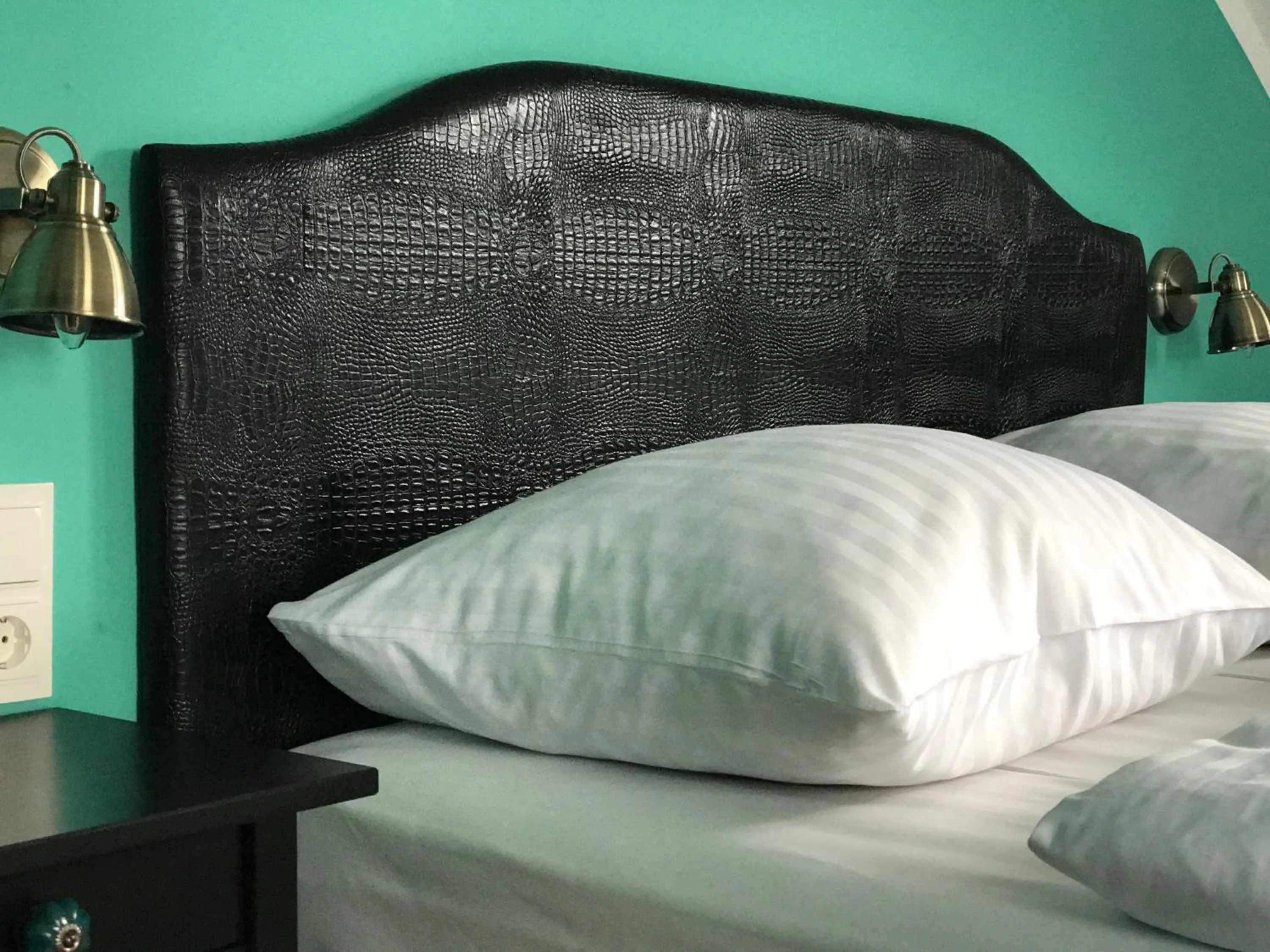 Decorative detail, Bed in SmartHotel Mystique Self check-in