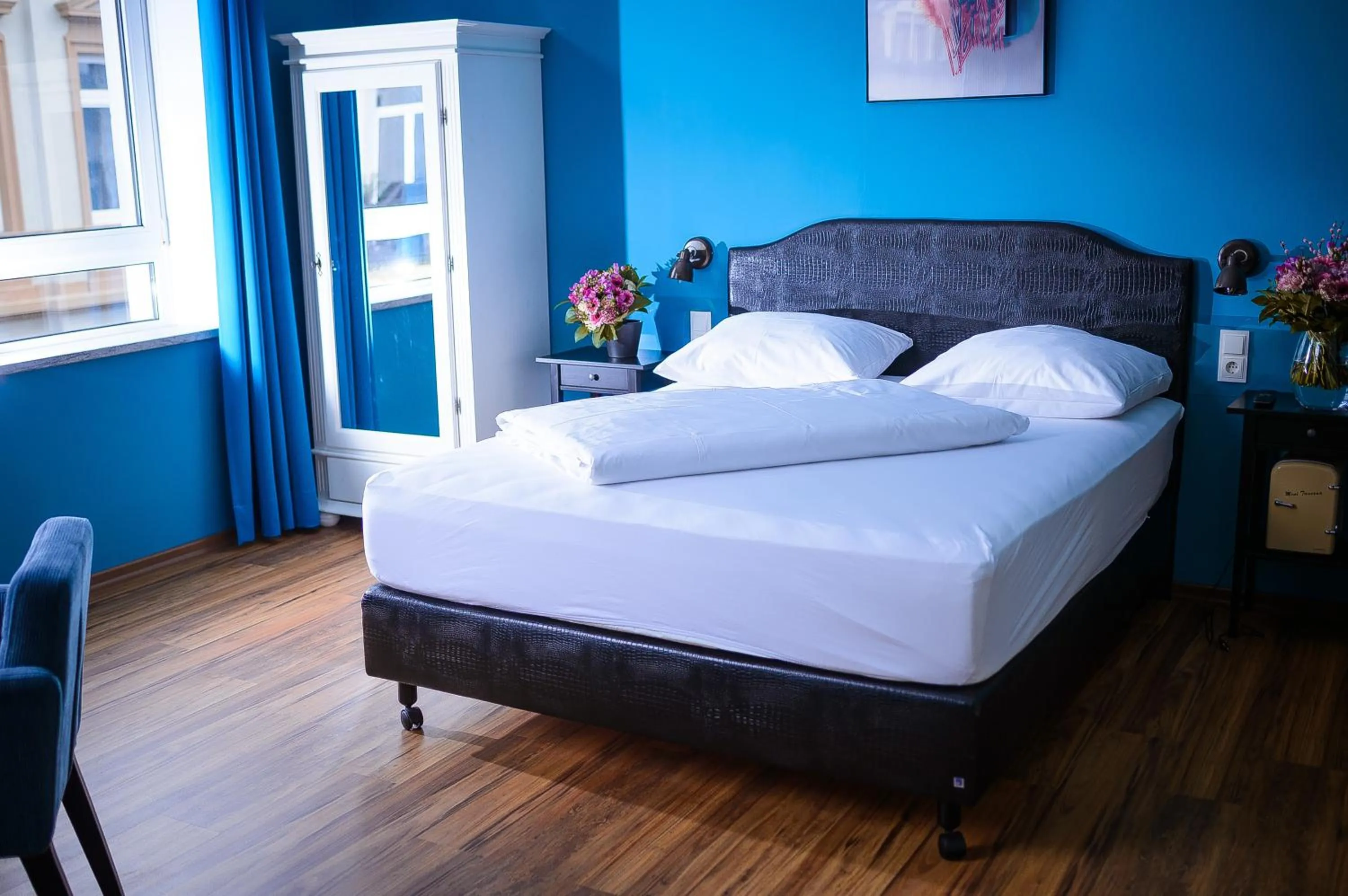 Bed in SmartHotel Mystique Self check-in