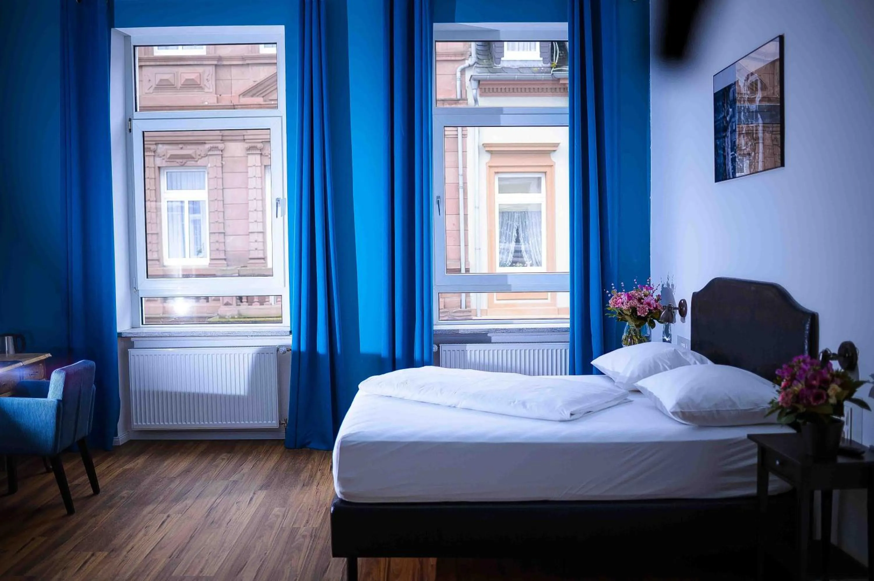 Bed in SmartHotel Mystique Self check-in