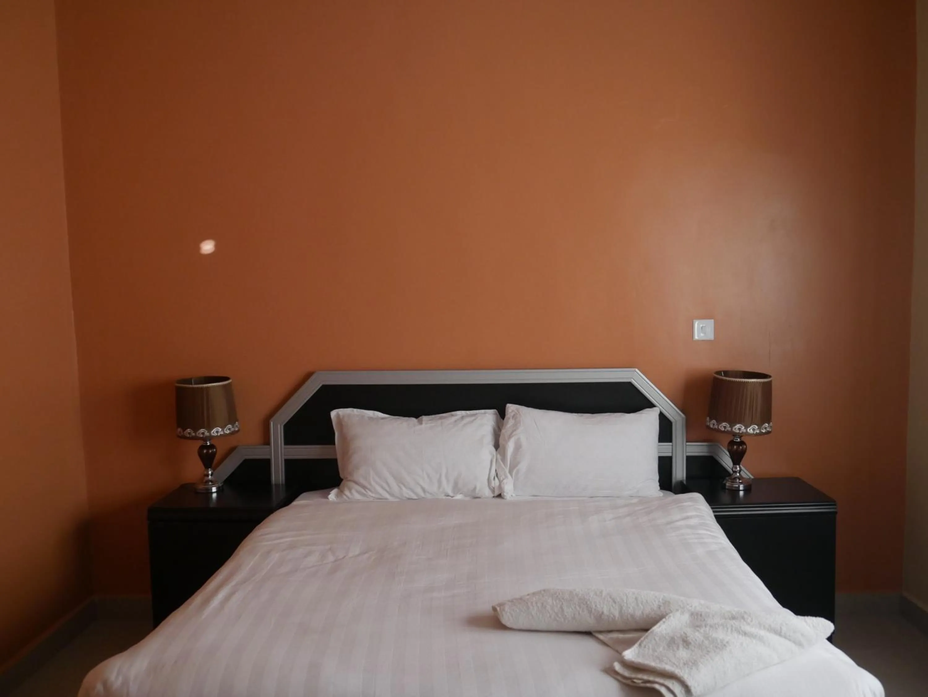 Bed in THE ESCAPE LODGE