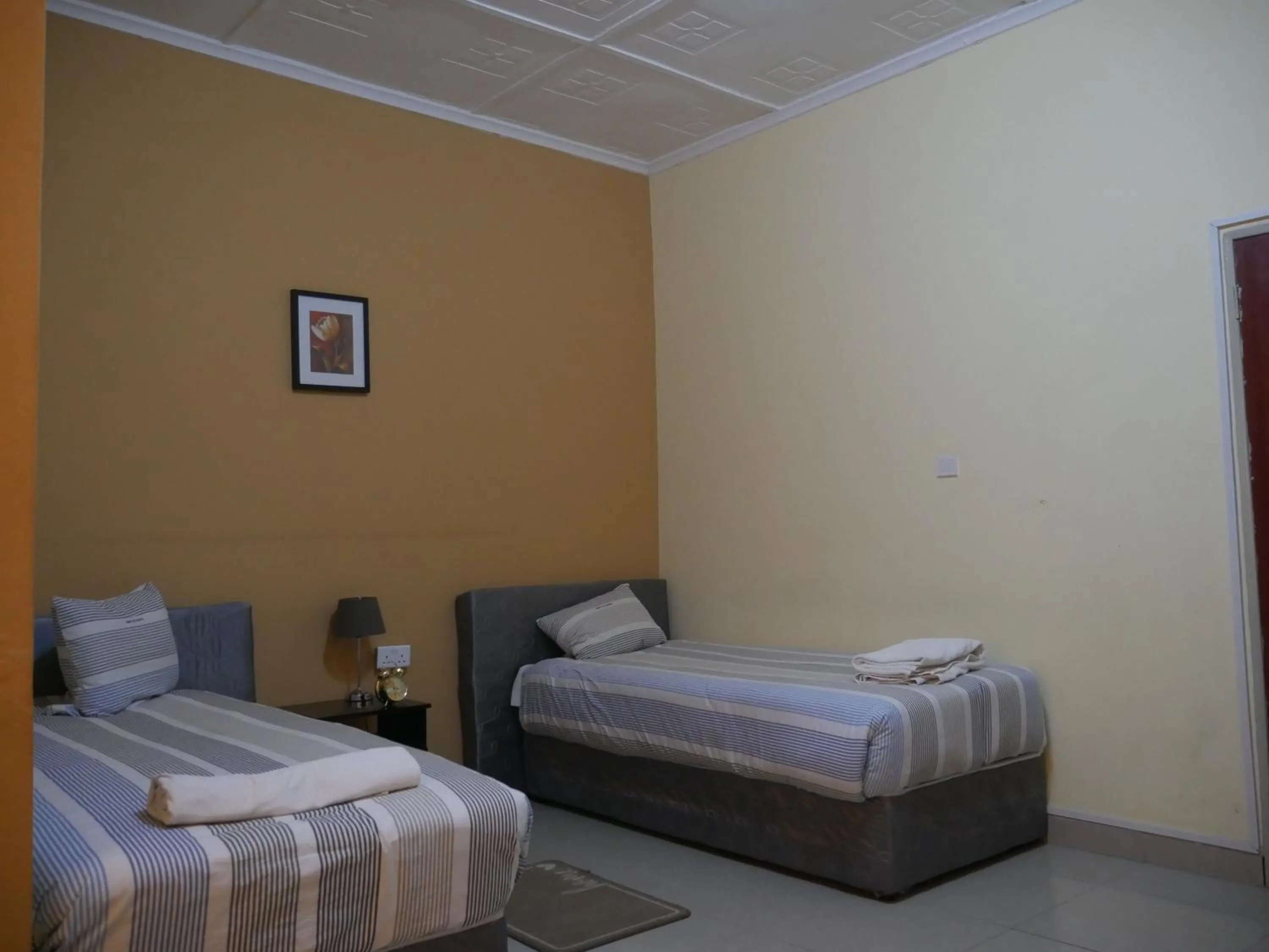 Bed in THE ESCAPE LODGE