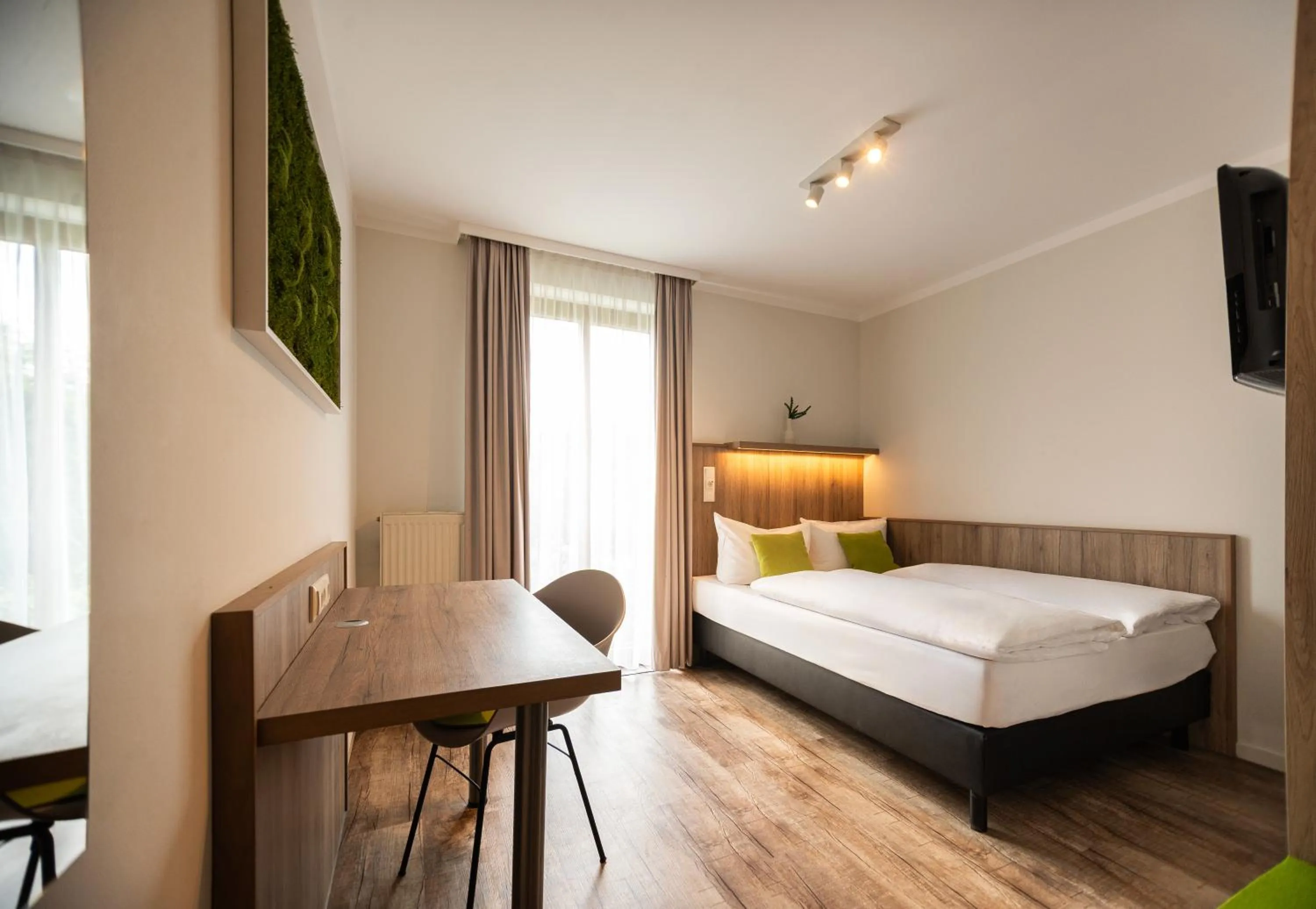 Photo of the whole room, Bed in Hotel Perlach Allee by Blattl