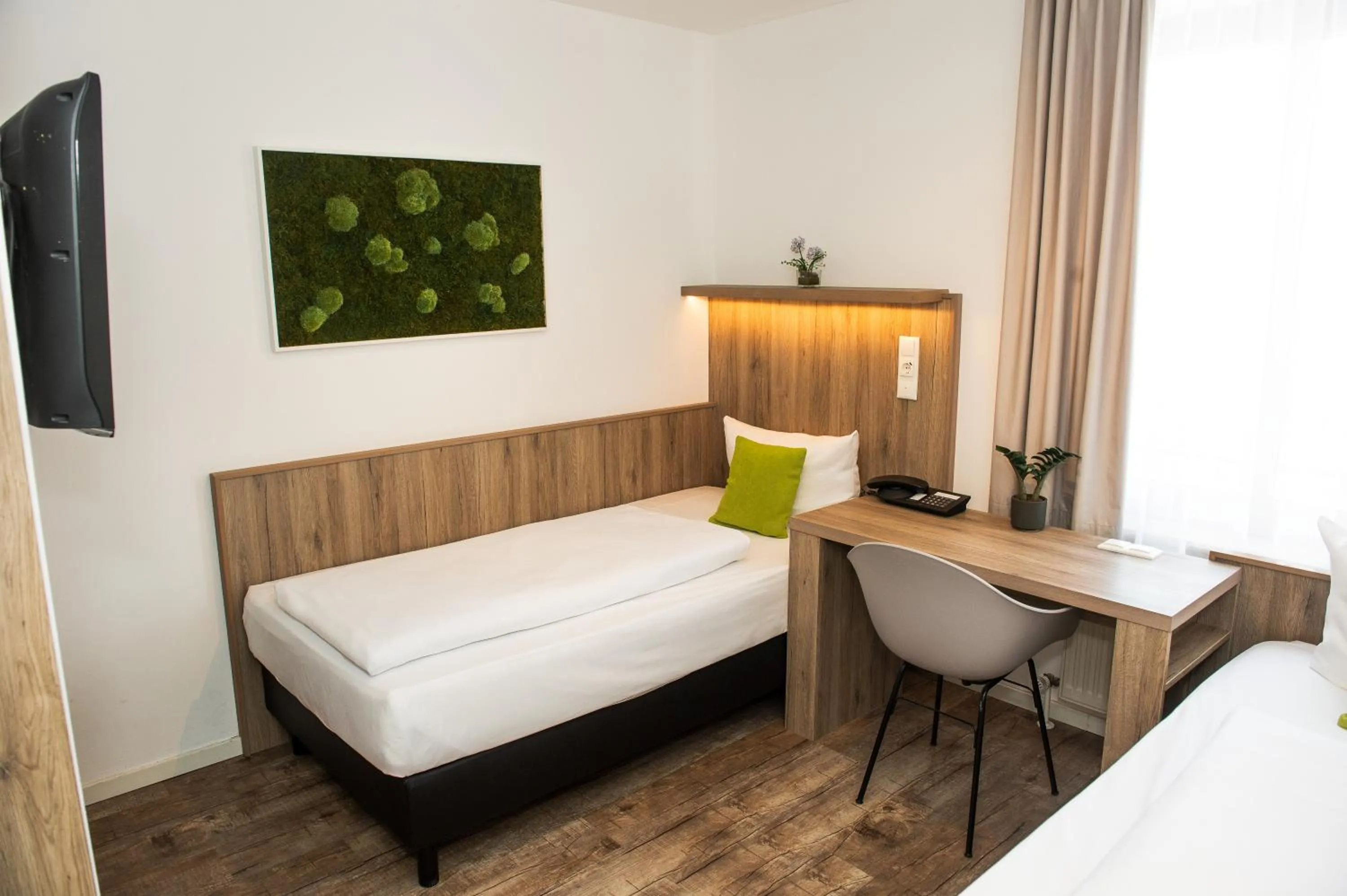 Photo of the whole room, Bed in Hotel Perlach Allee by Blattl